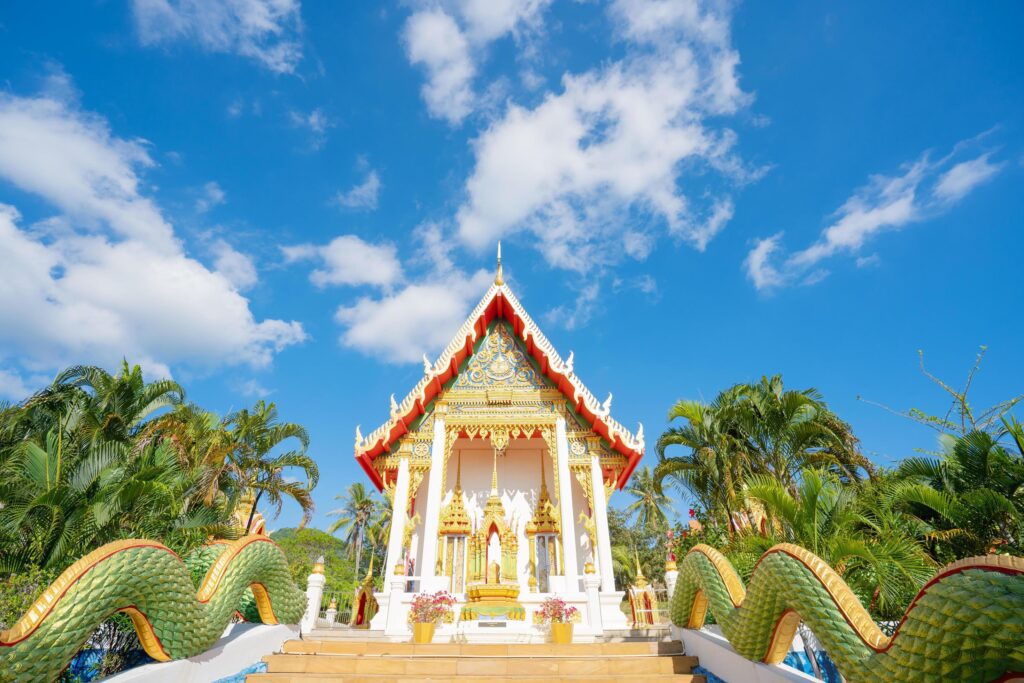 Wat Karon Buddhist temple travel summer trip famous landmark Phuket ,Thailand. Stock Free