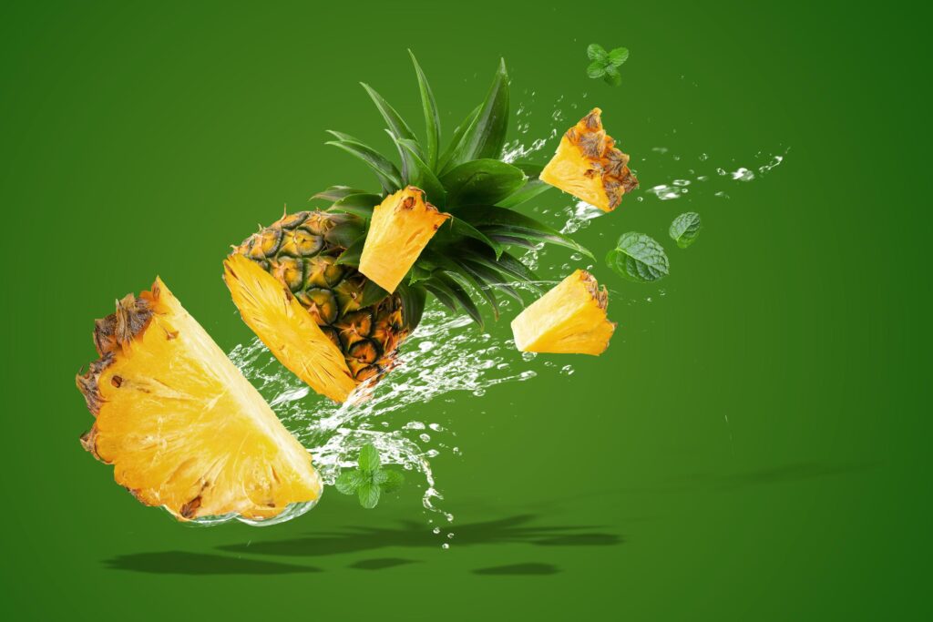 Water splashing on fresh pineapple Stock Free