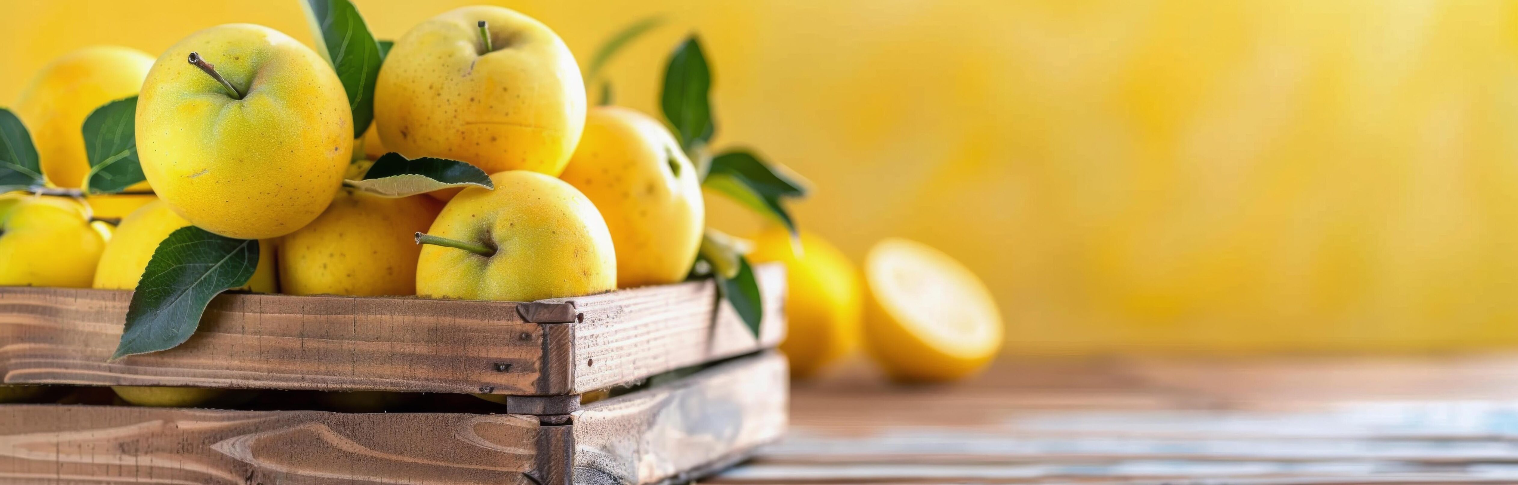 Fresh Yellow Apples in Wooden Crate on Rustic Table With Yellow Background Stock Free