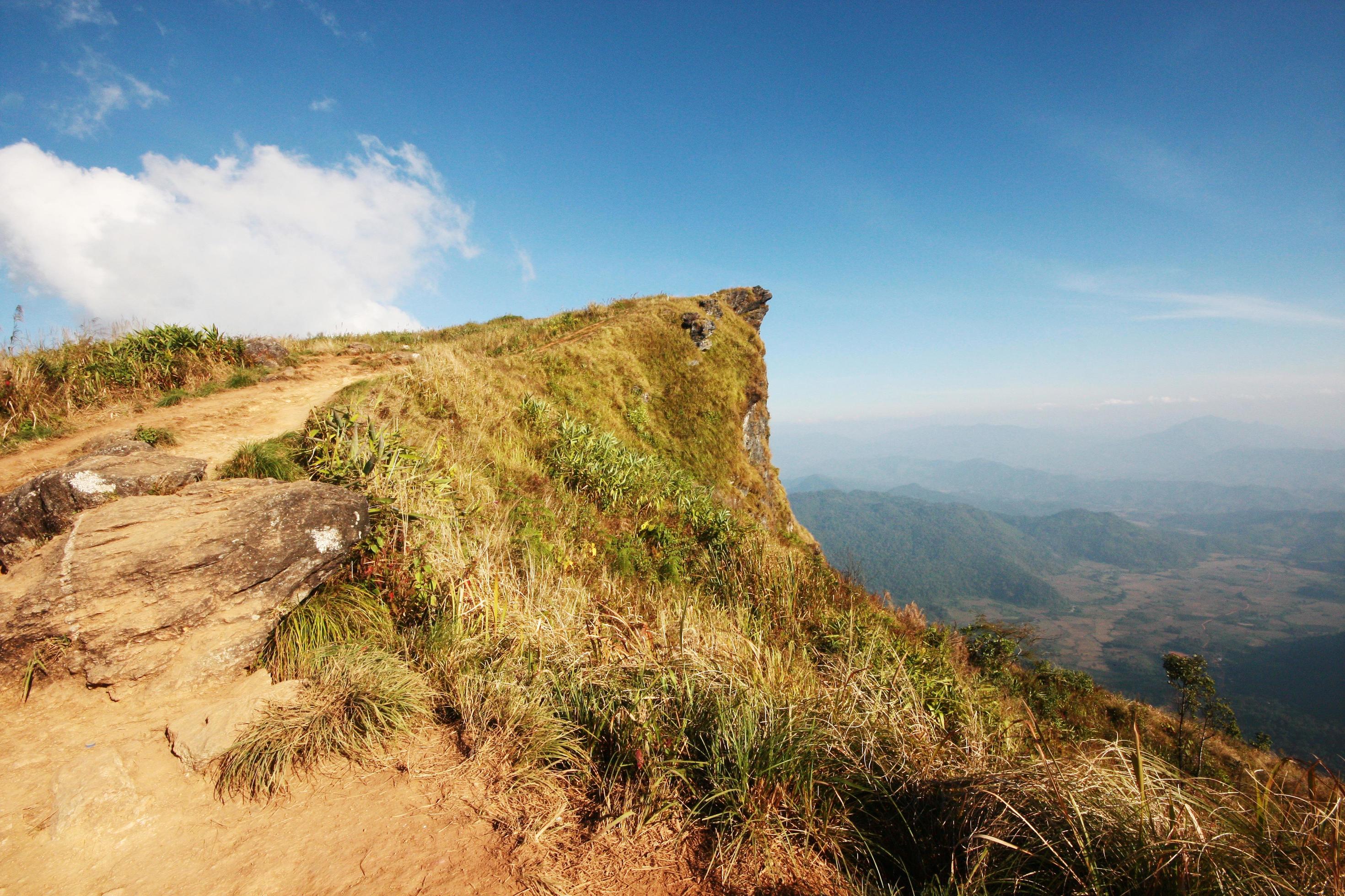 Beautiful landscape valley of mountain and blue sky in winter at Phu Chee Fah hill northern of Thailand Stock Free