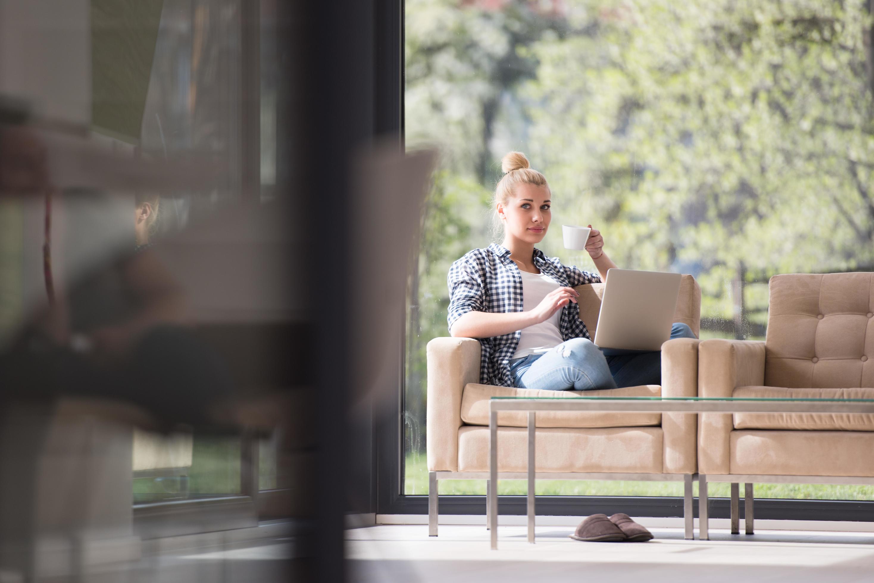 woman drinking coffee enjoying relaxing lifestyle Stock Free