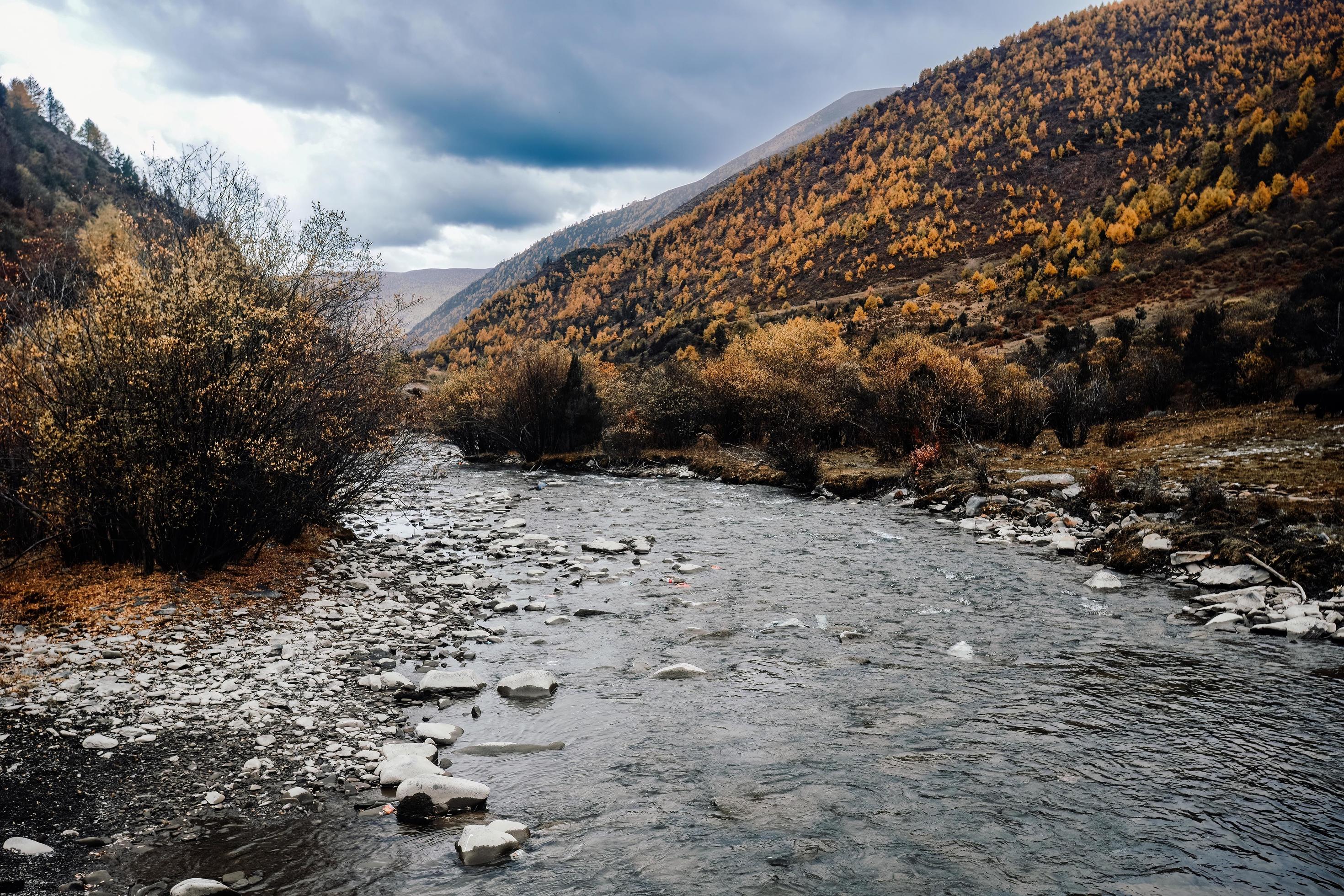 Spectacular scenery in the high mountains of western Sichuan, China, with different seasons Stock Free