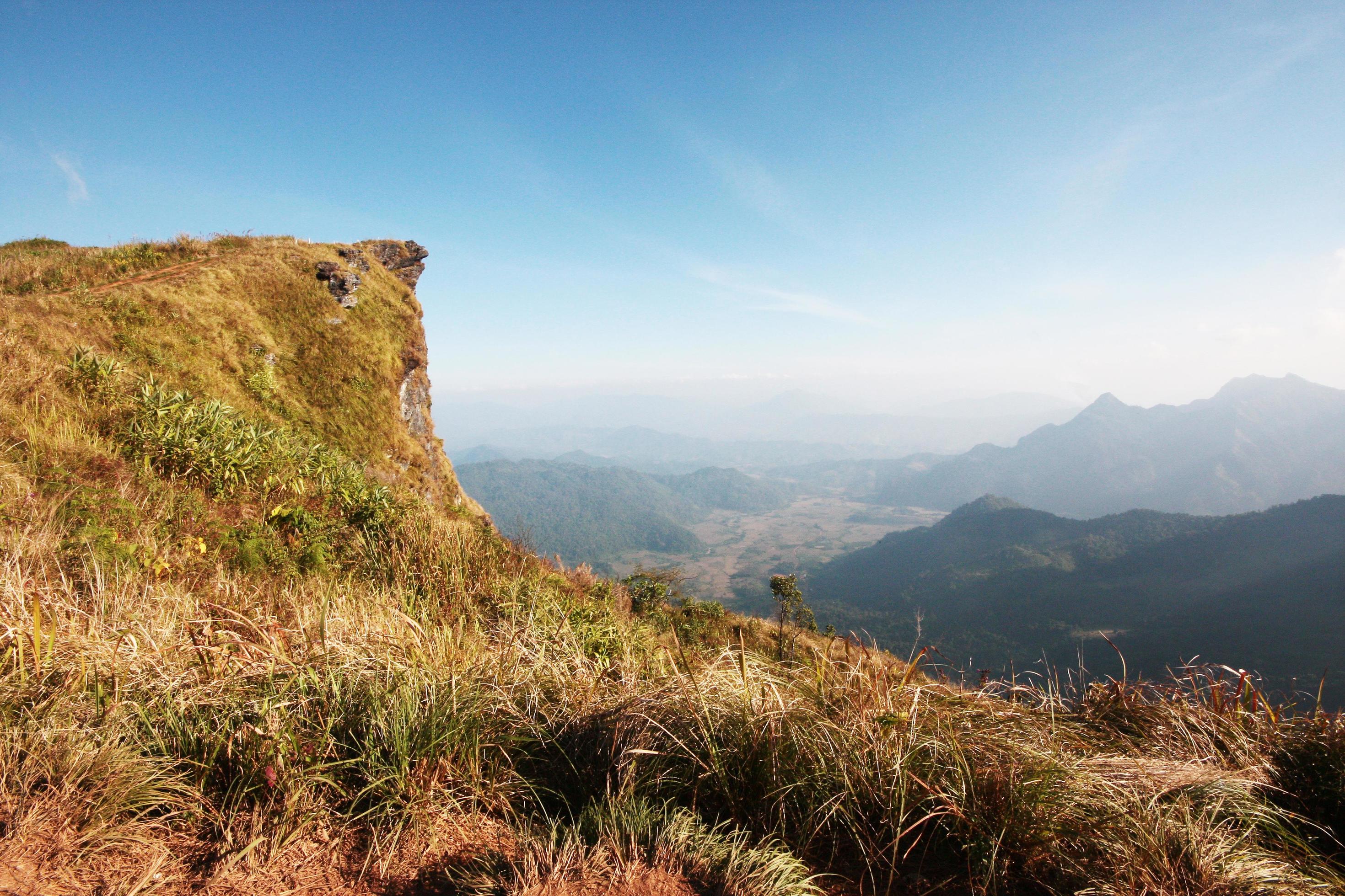 Beautiful landscape valley of mountain and blue sky in winter at Phu Chee Fah hill northern of Thailand Stock Free