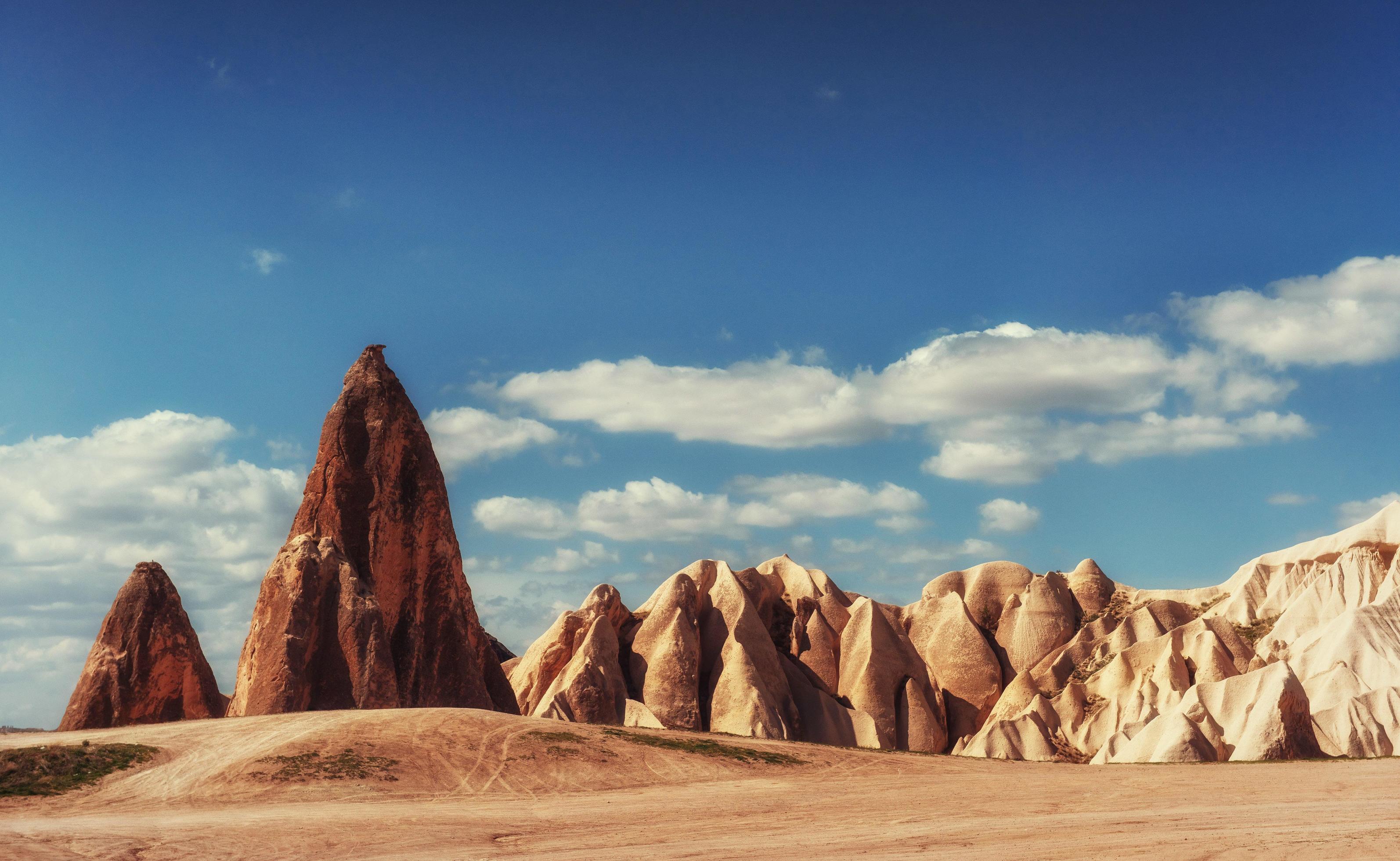 Beautiful Cappadocia on the background of blue sky with white Stock Free