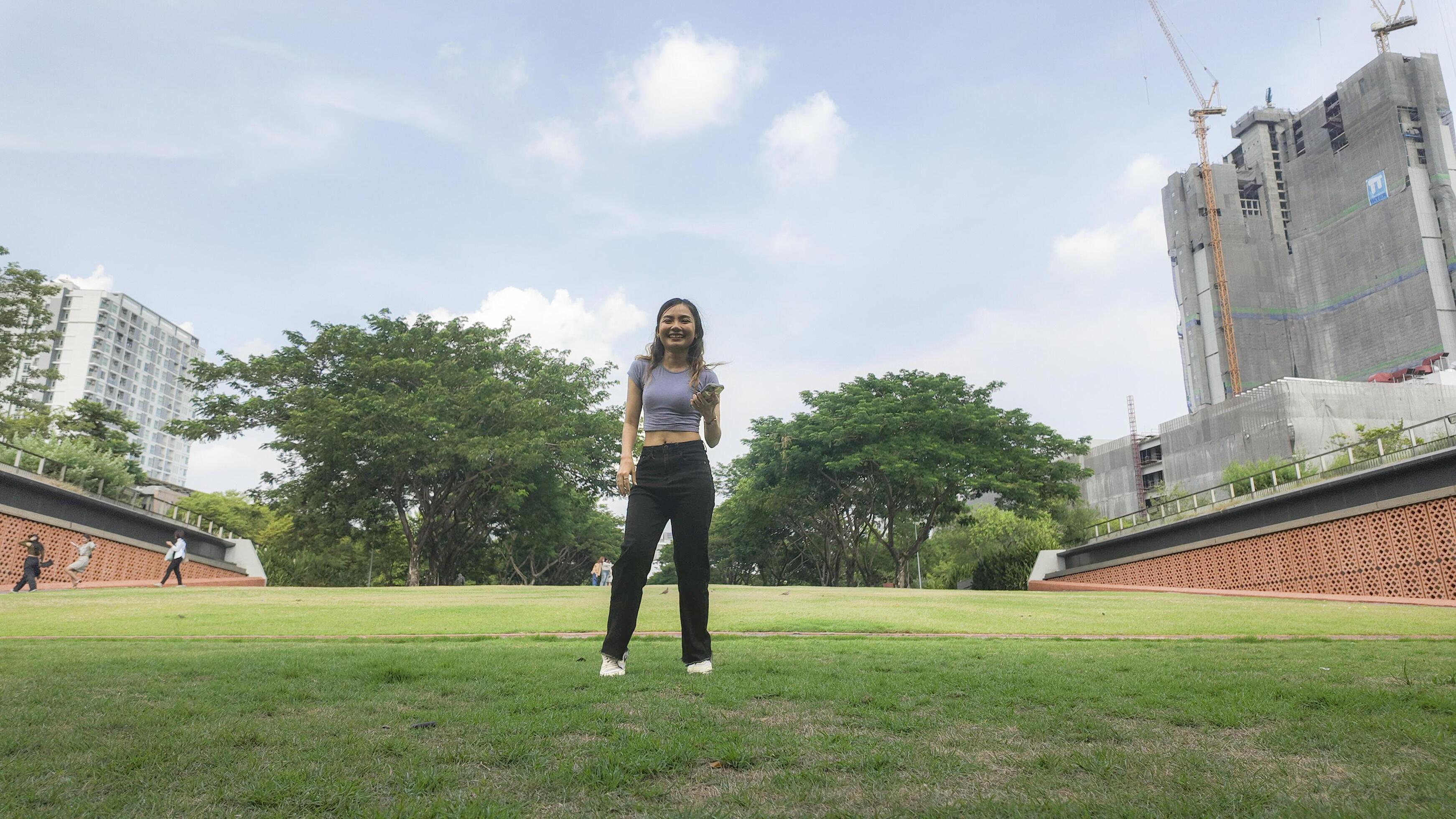 
									Asian women do freestyle hip hop and breakdancing in a public space in the middle of the city. With a cheerful and happy attitude Stock Free