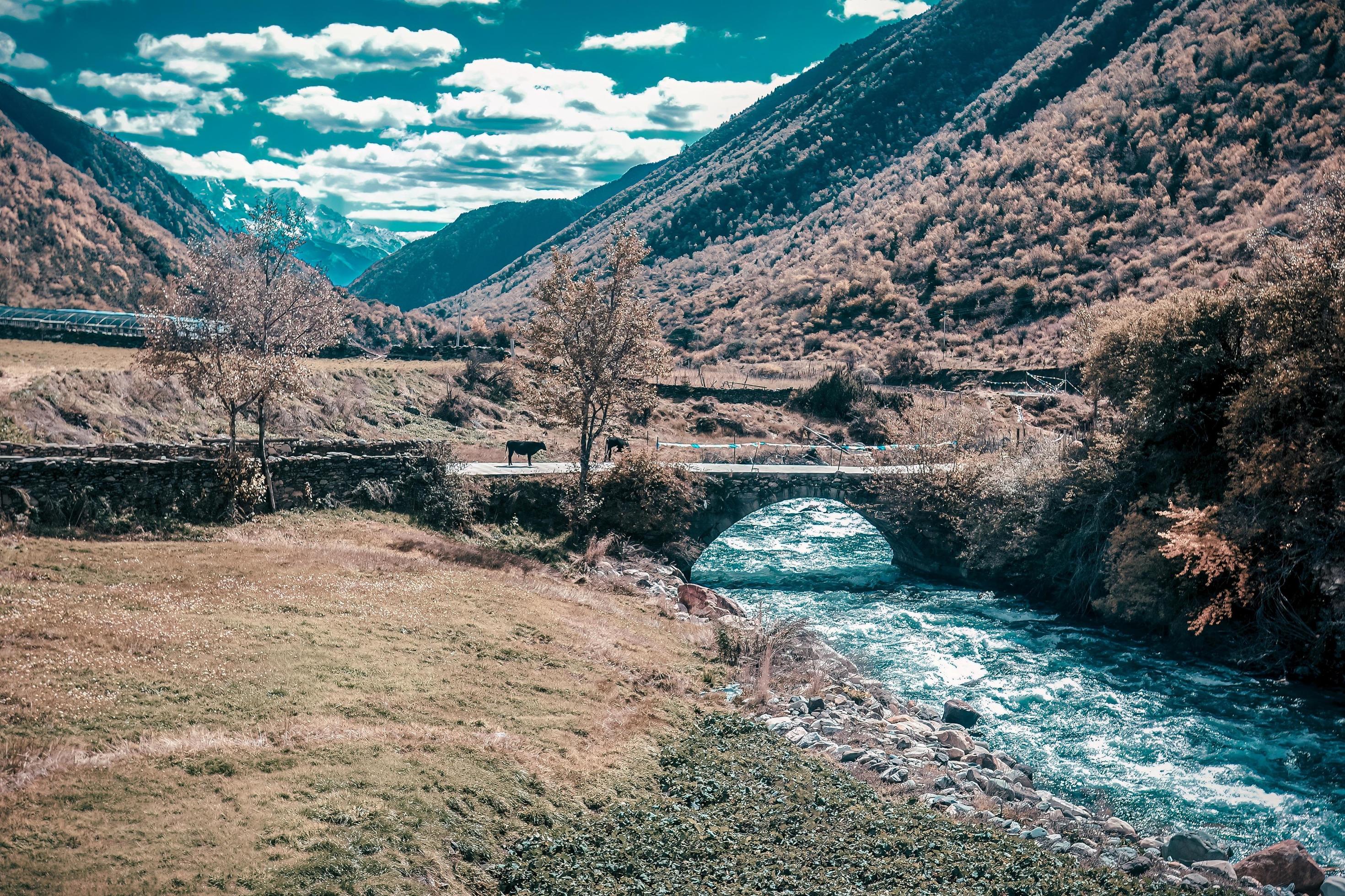 Spectacular scenery in the high mountains of western Sichuan, China, with different seasons Stock Free