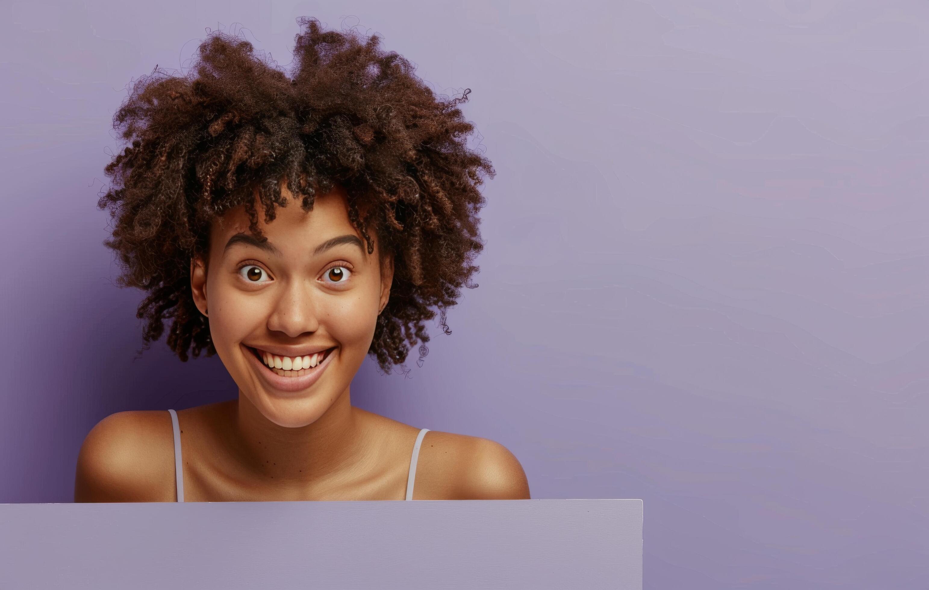 
									Smiling Woman Peeking Over Light Purple Background Stock Free