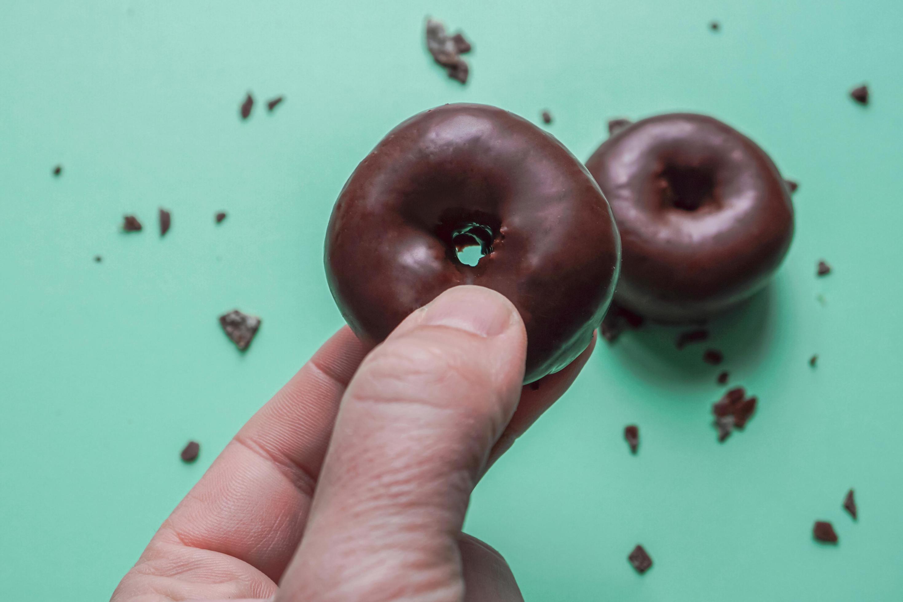 tasty chocolate donut for brunch, unhealthy food Stock Free