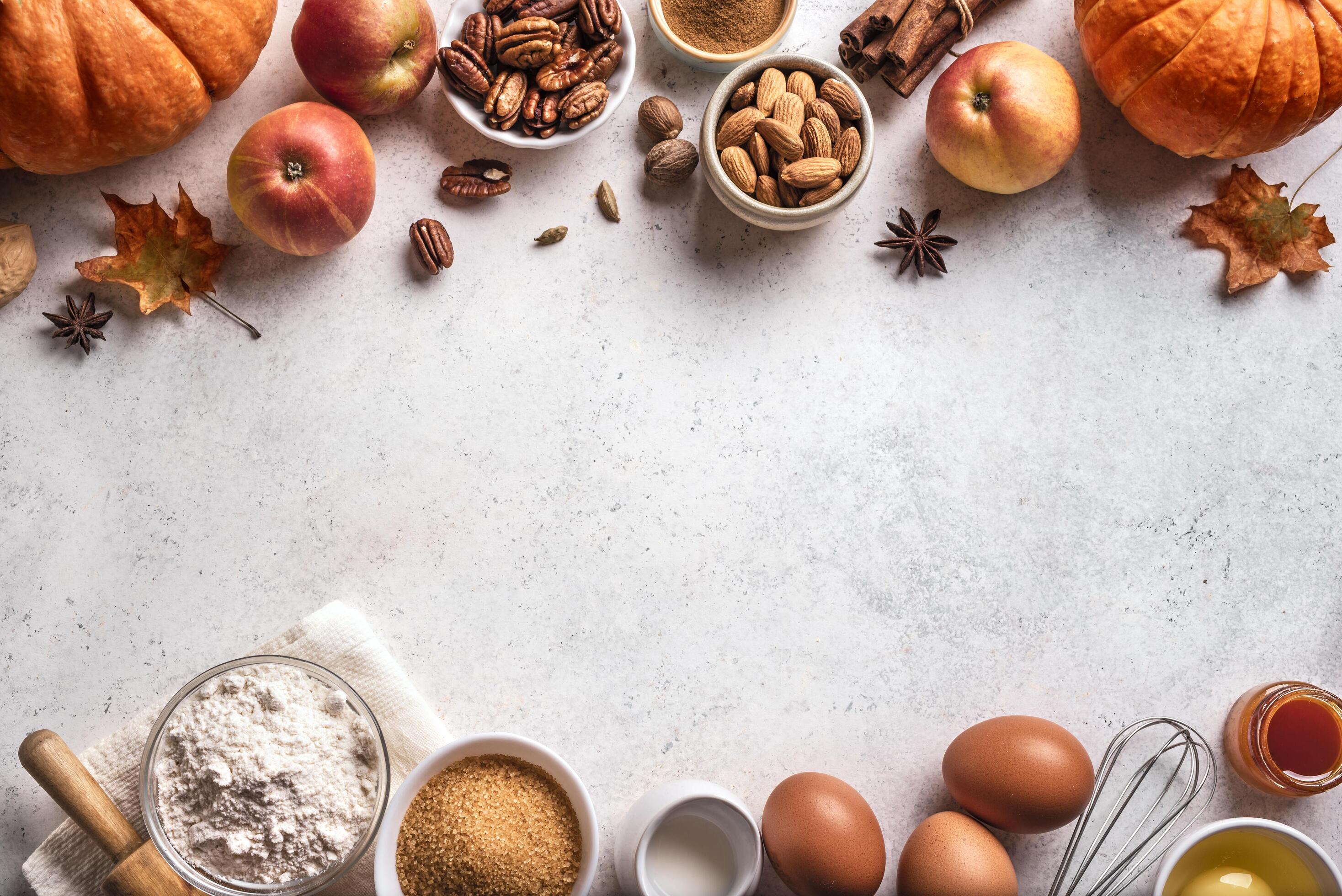 Autumn baking background with pumpkins, apples and nuts Stock Free