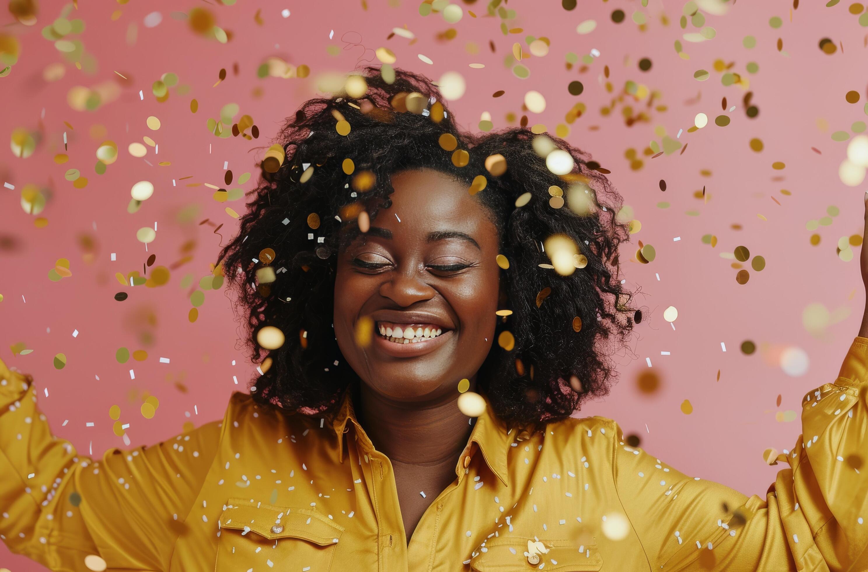 Happy Woman Celebrating With Confetti in Front of Pink Background Stock Free