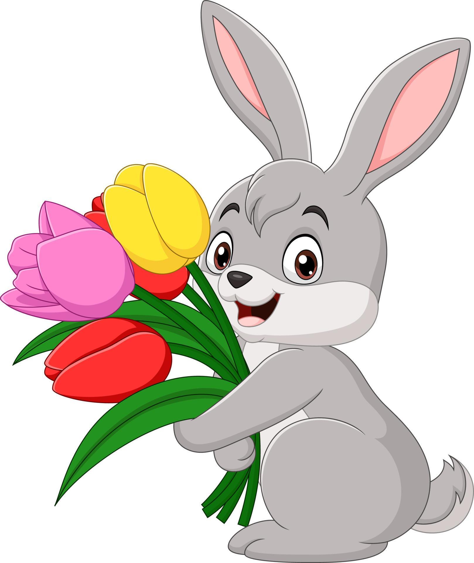 Cute baby rabbit holding a flowers Stock Free