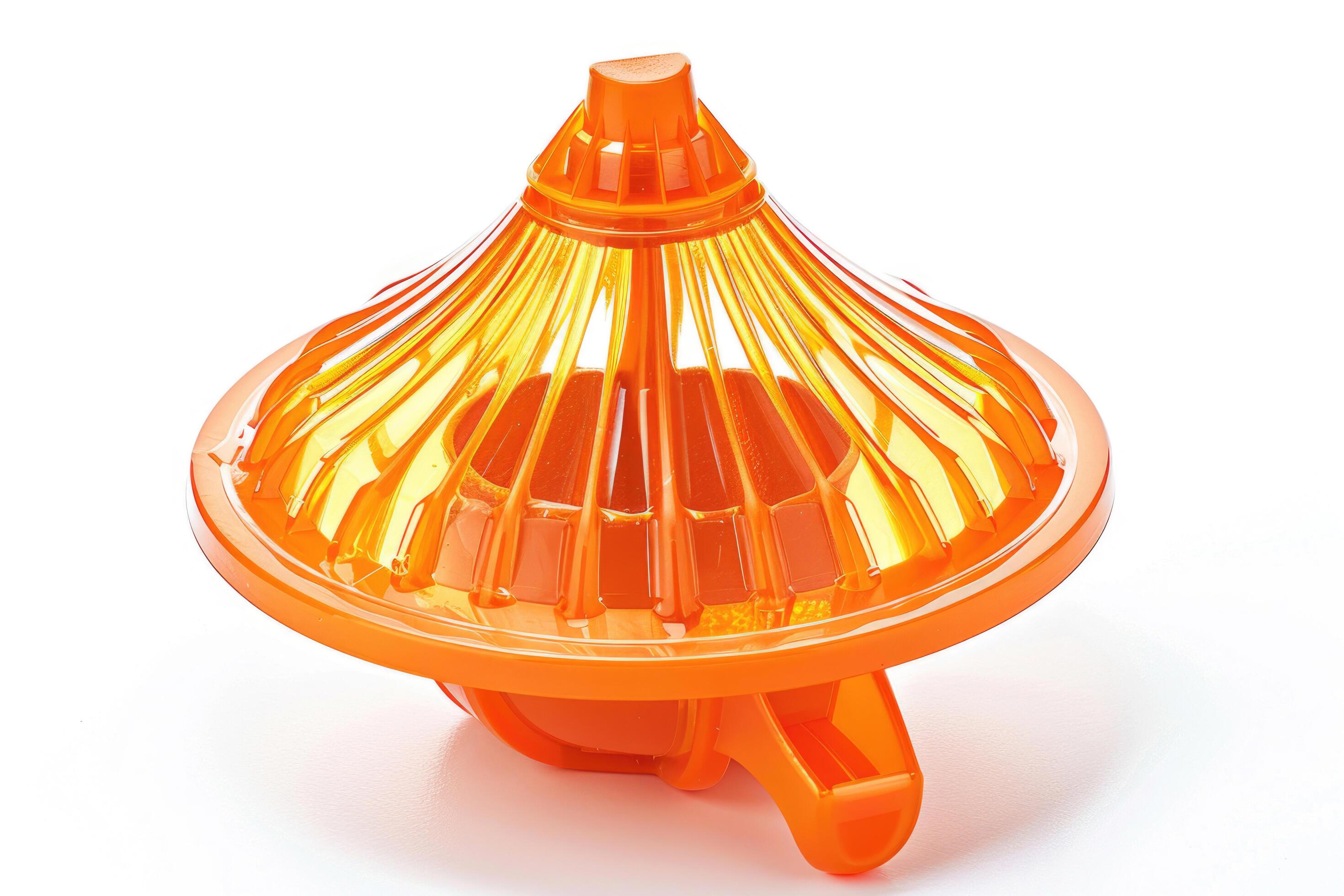 Plastic citrus juicer on a white background. Stock Free