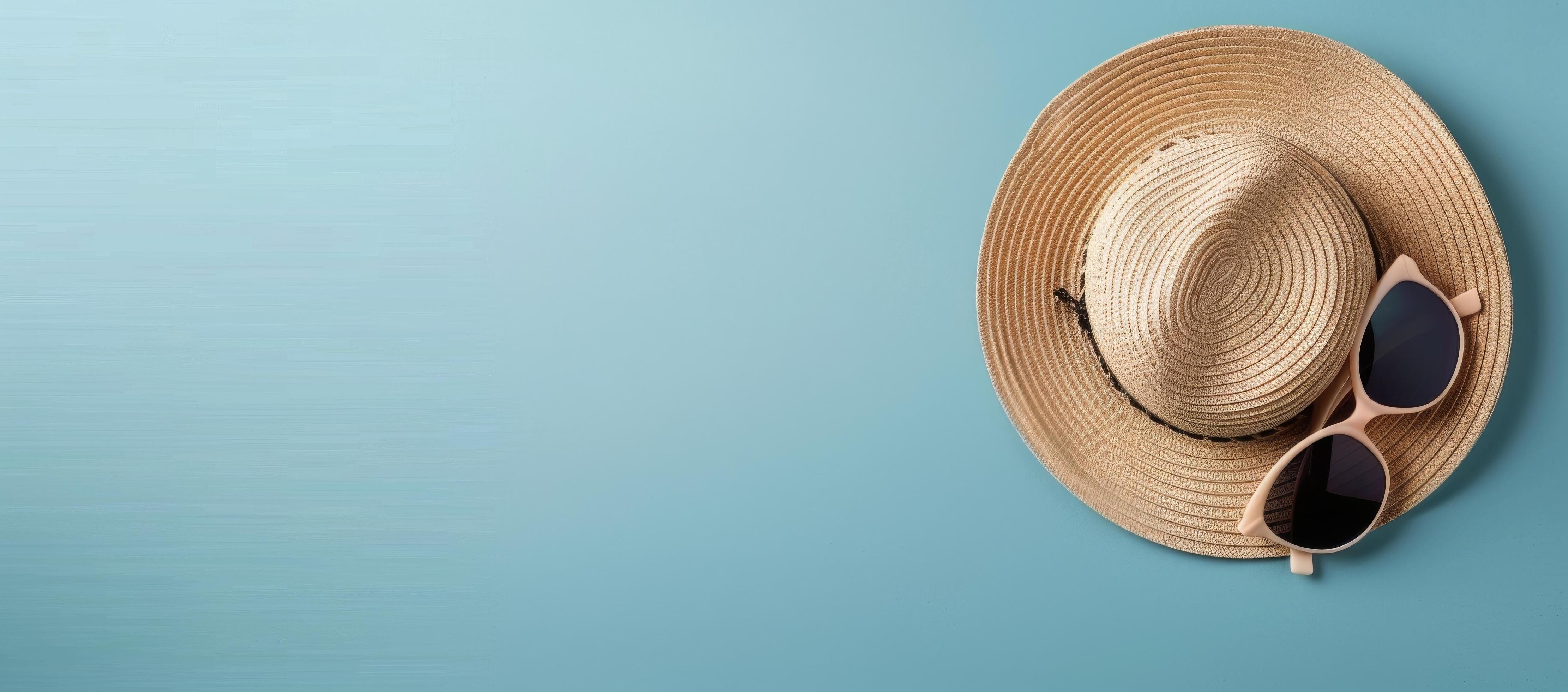 Summer Hat and Sunglasses on Light Blue Background Stock Free