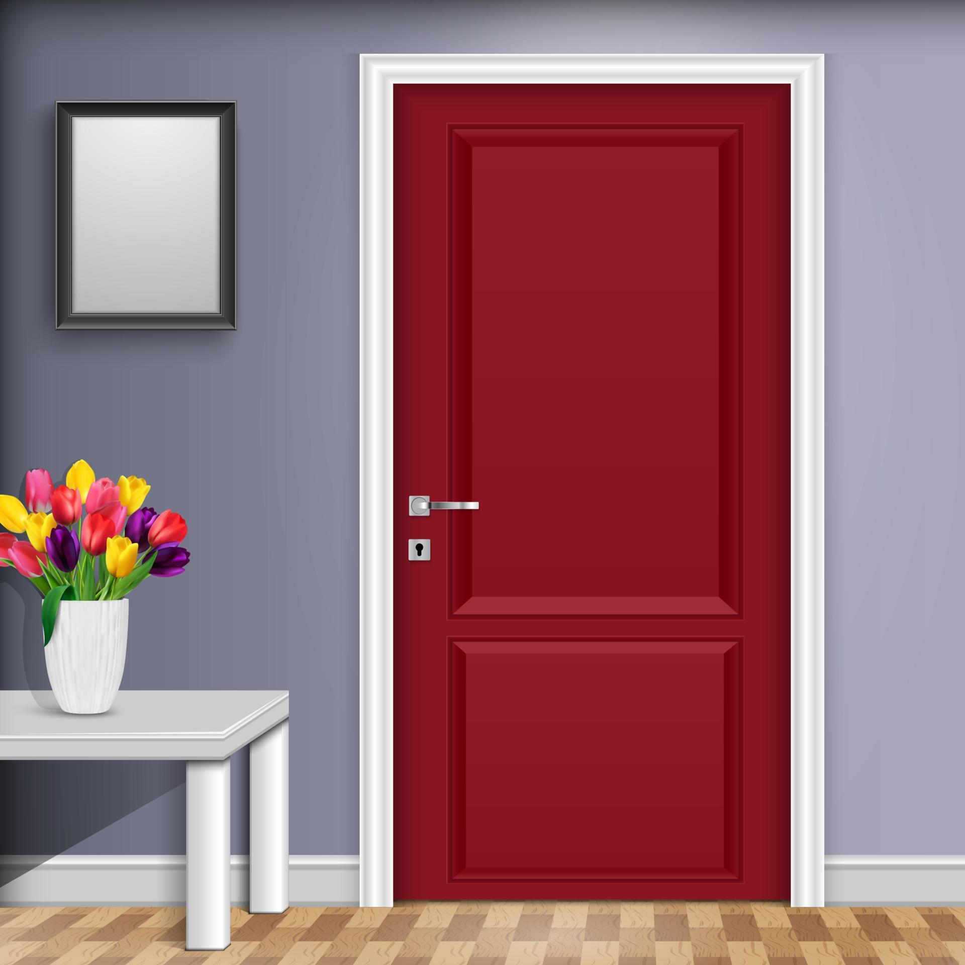 Closed red door with vase and flowers over white table isolated on gray wall background Stock Free