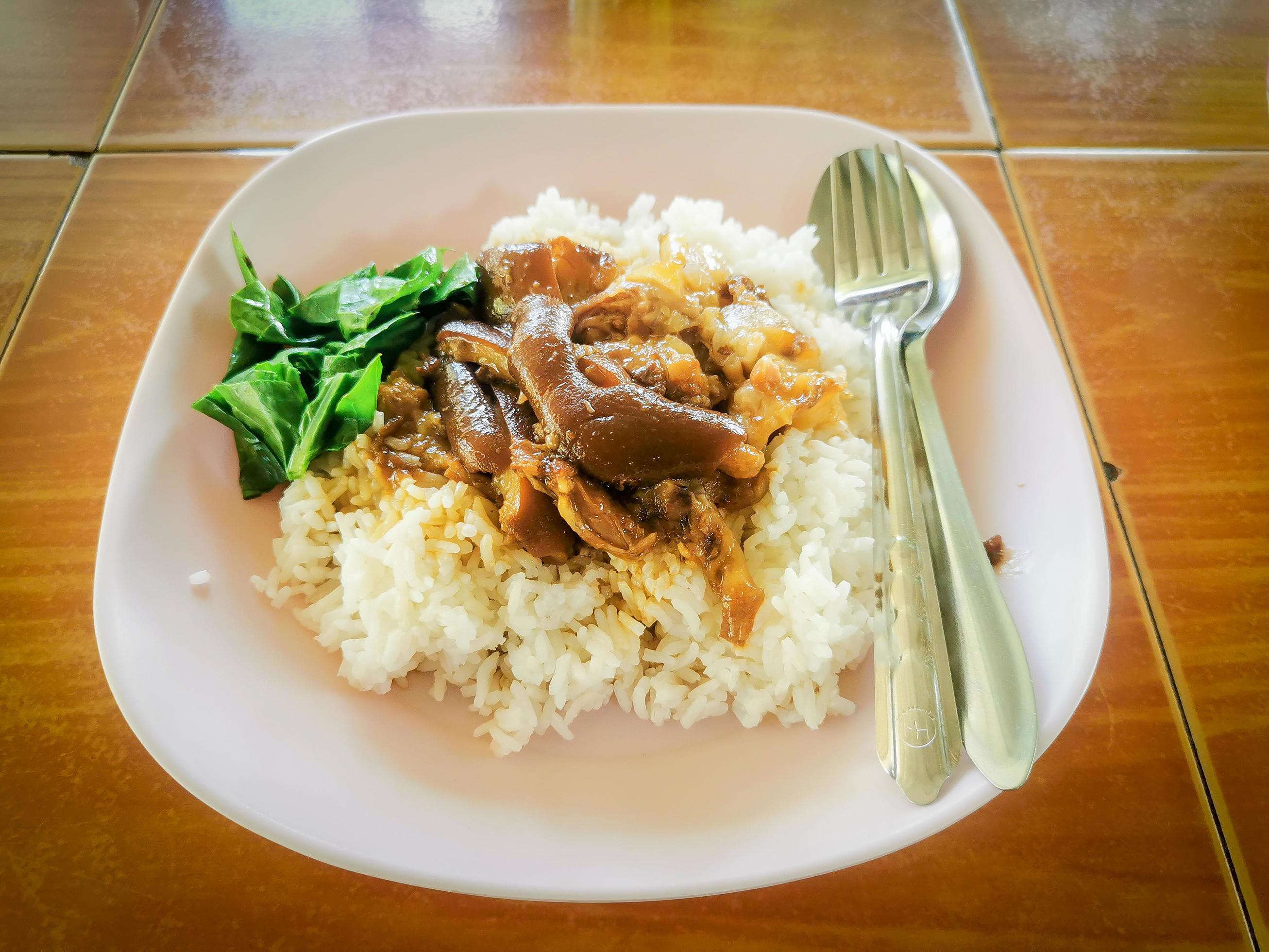 Must-try Thai food with pork leg rice Stock Free