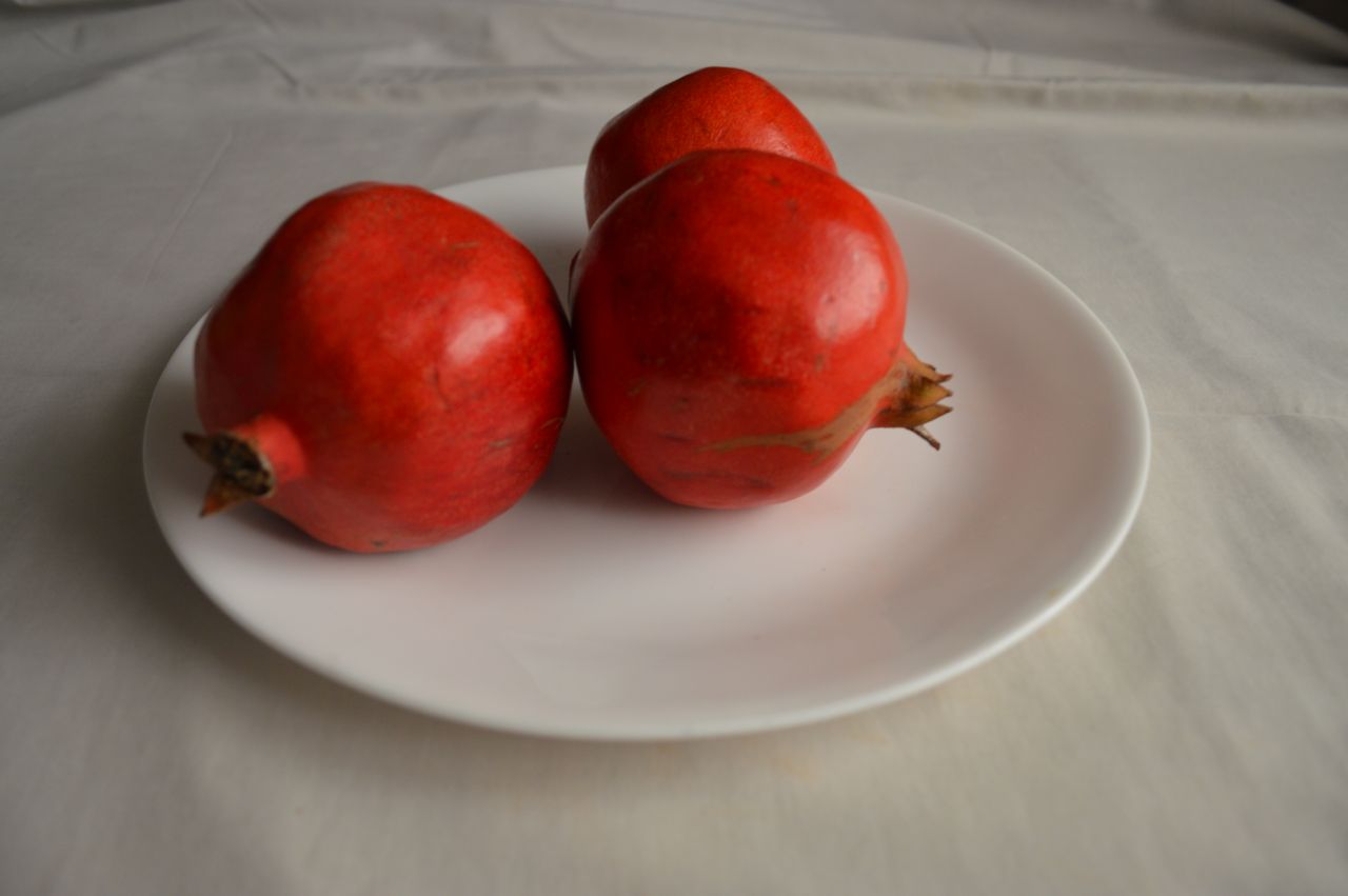 Pomegranates On A Dish Stock Free