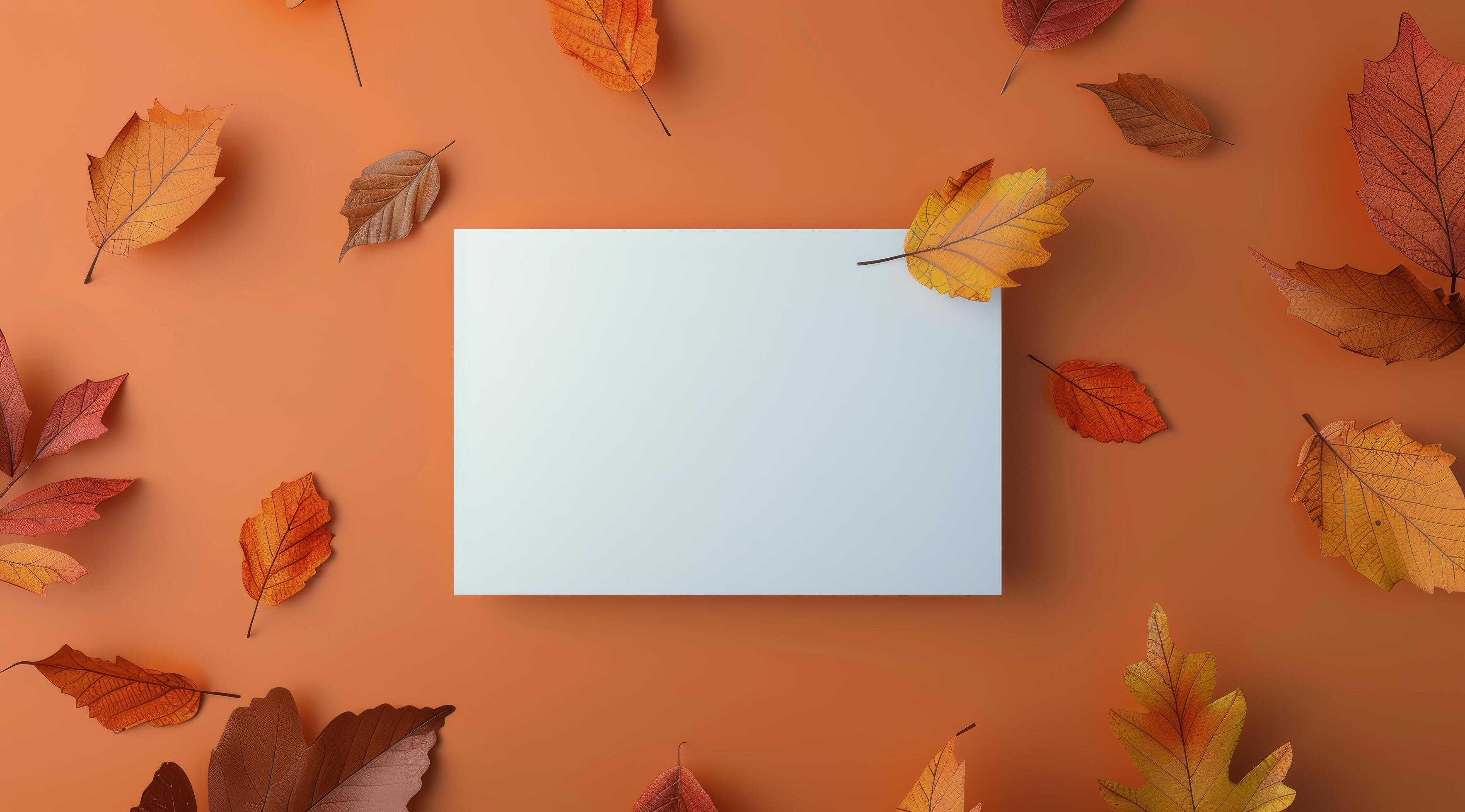 White Paper With Autumn Leaves On Peach Background Stock Free