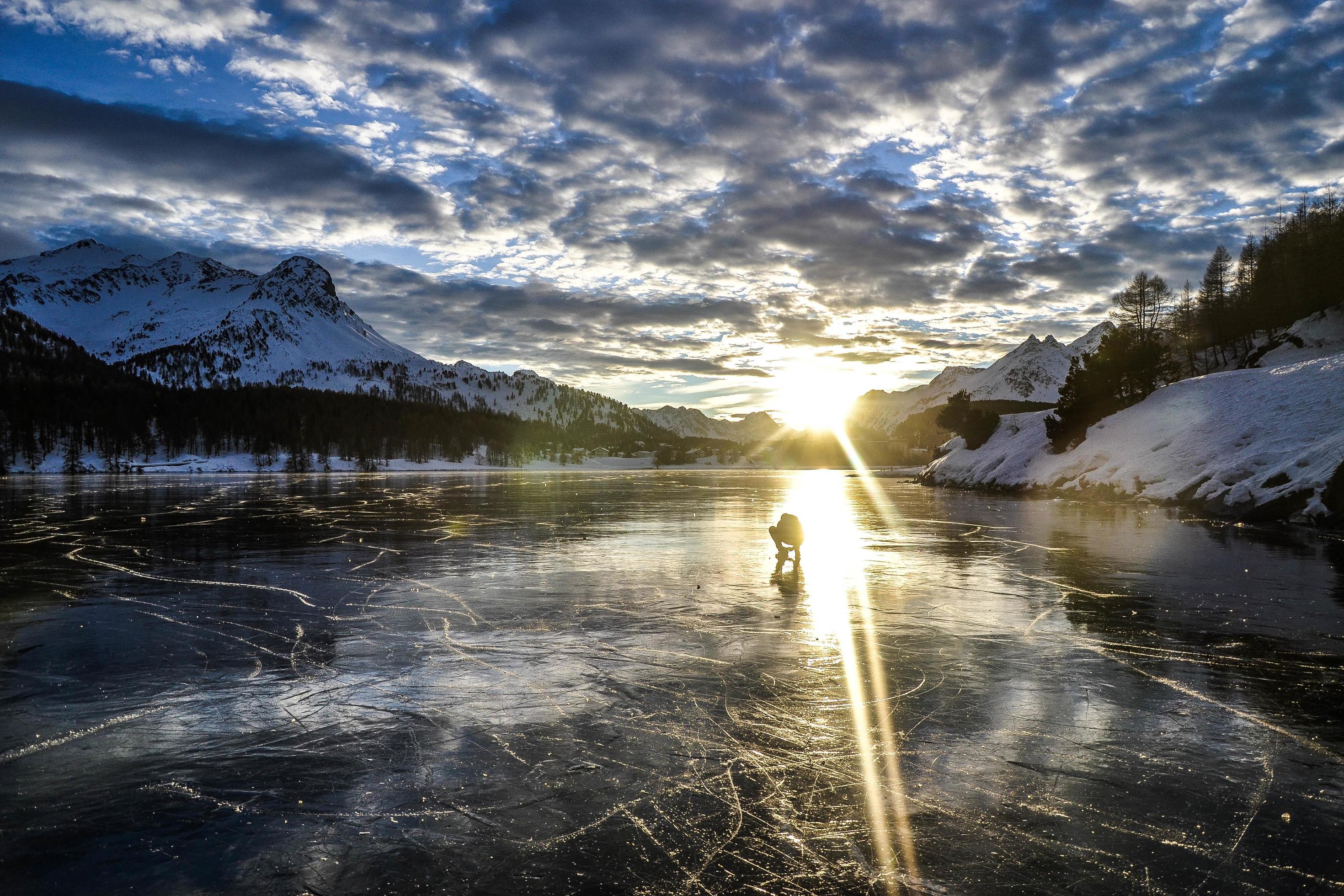 Sunset over the frozen lake Stock Free