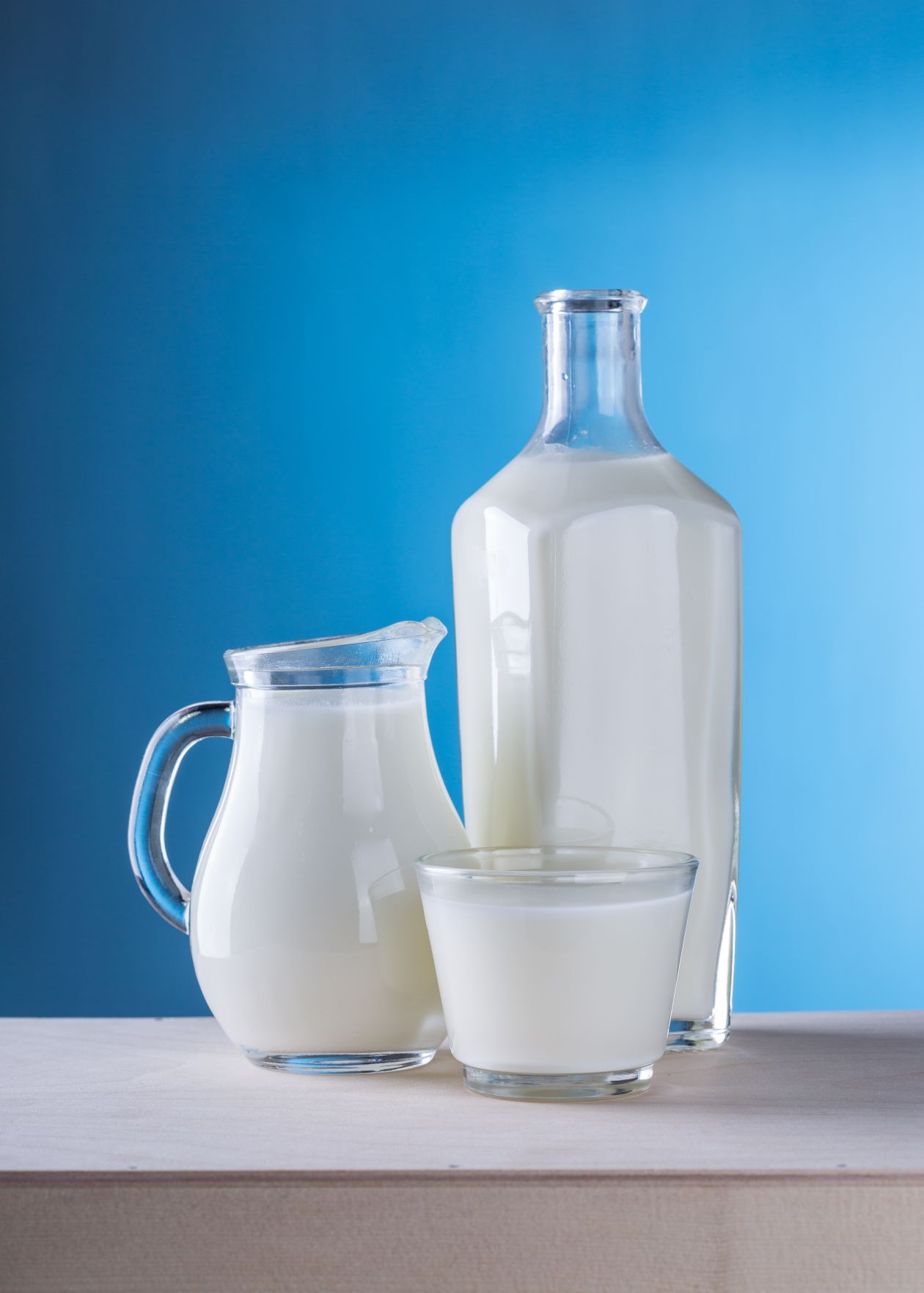 Milk Against Blue Background Stock Free