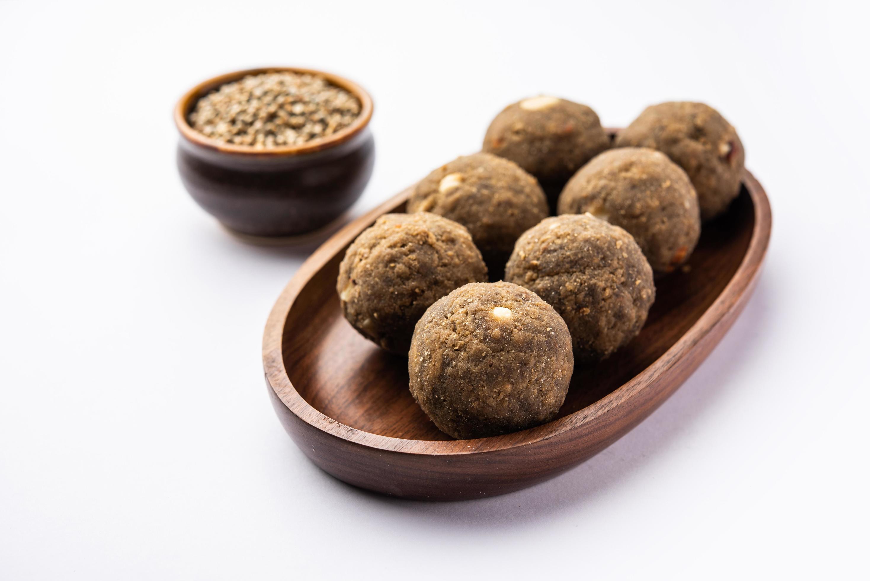 Bajra Atta Ladoo or kuler laddoo – Millet Flour Laddu, a popular winter sweet snack food from India Stock Free