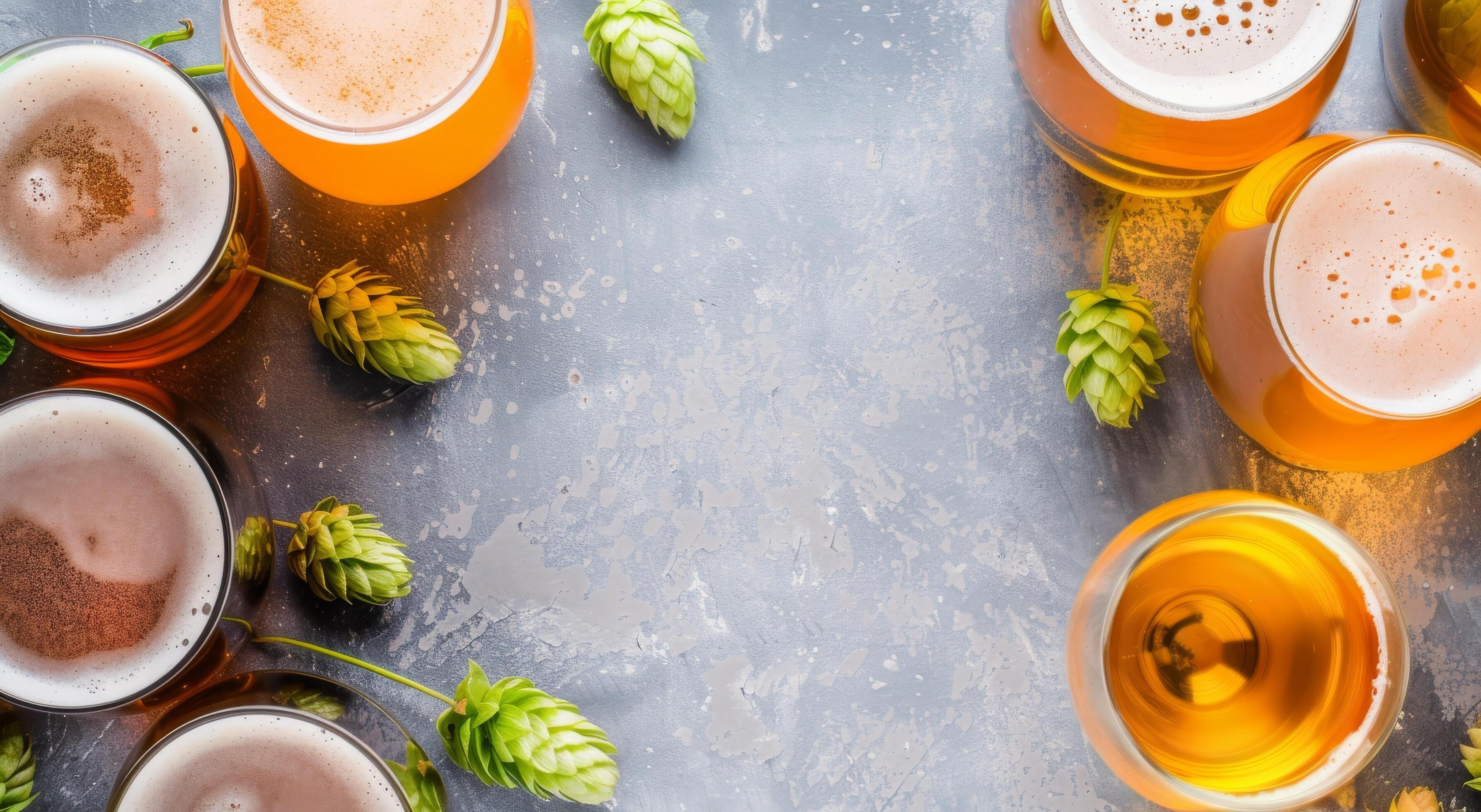 Variety of Craft Beers With Hops on Table Background Stock Free