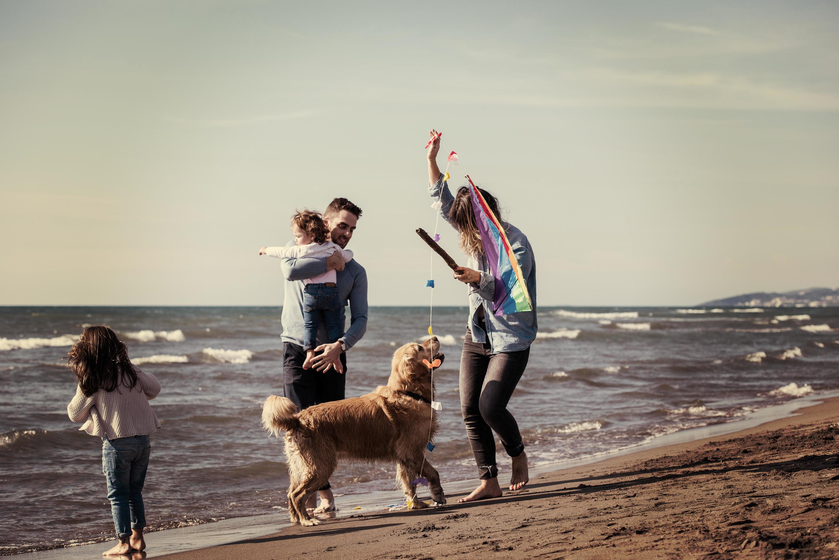 happy young family enjoying vecation during autumn day Stock Free