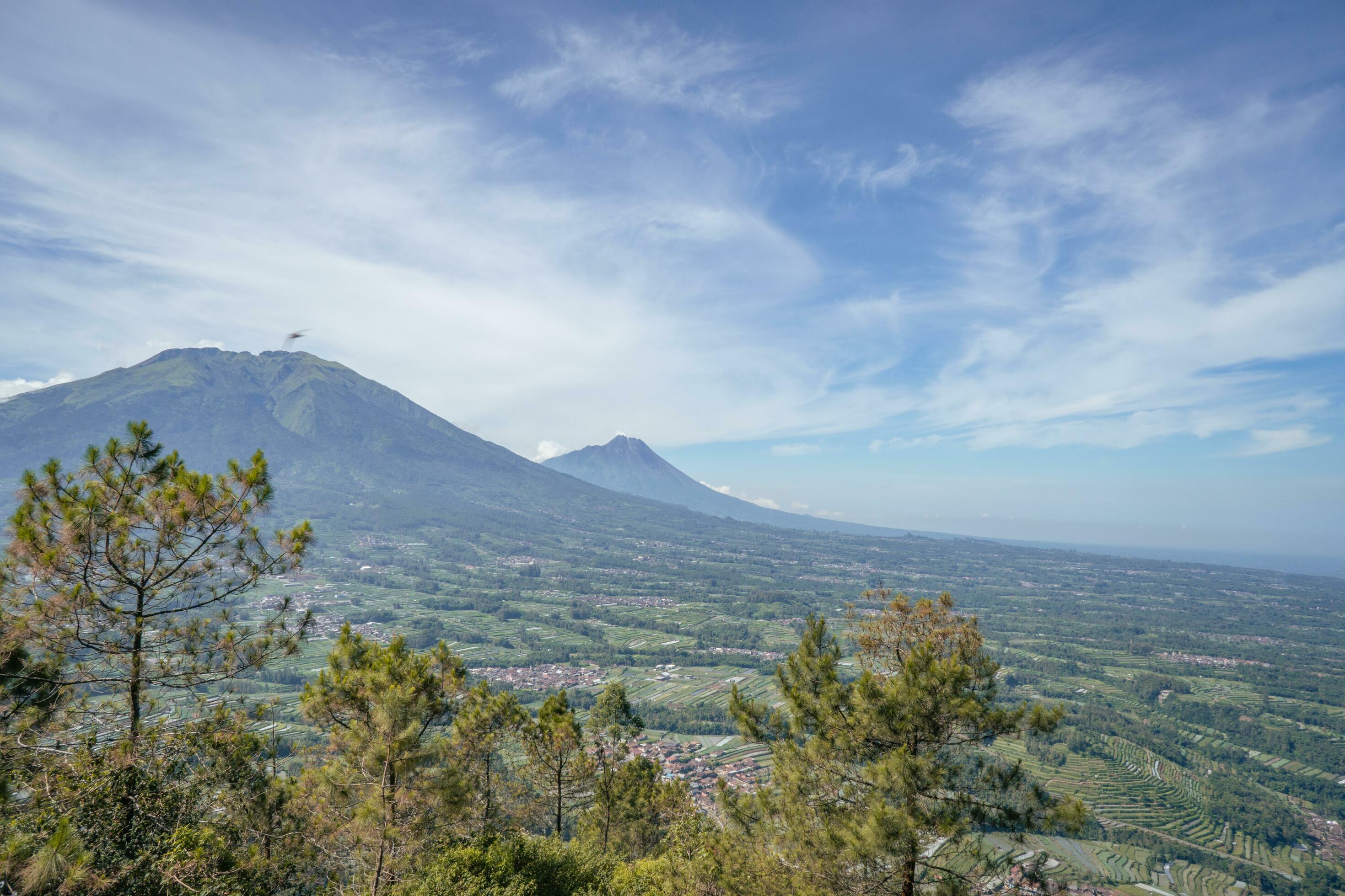 Landscape mountain when morning time sunlight summer vibes. The photo is suitable to use for adventure content media, nature poster and forest background. Stock Free