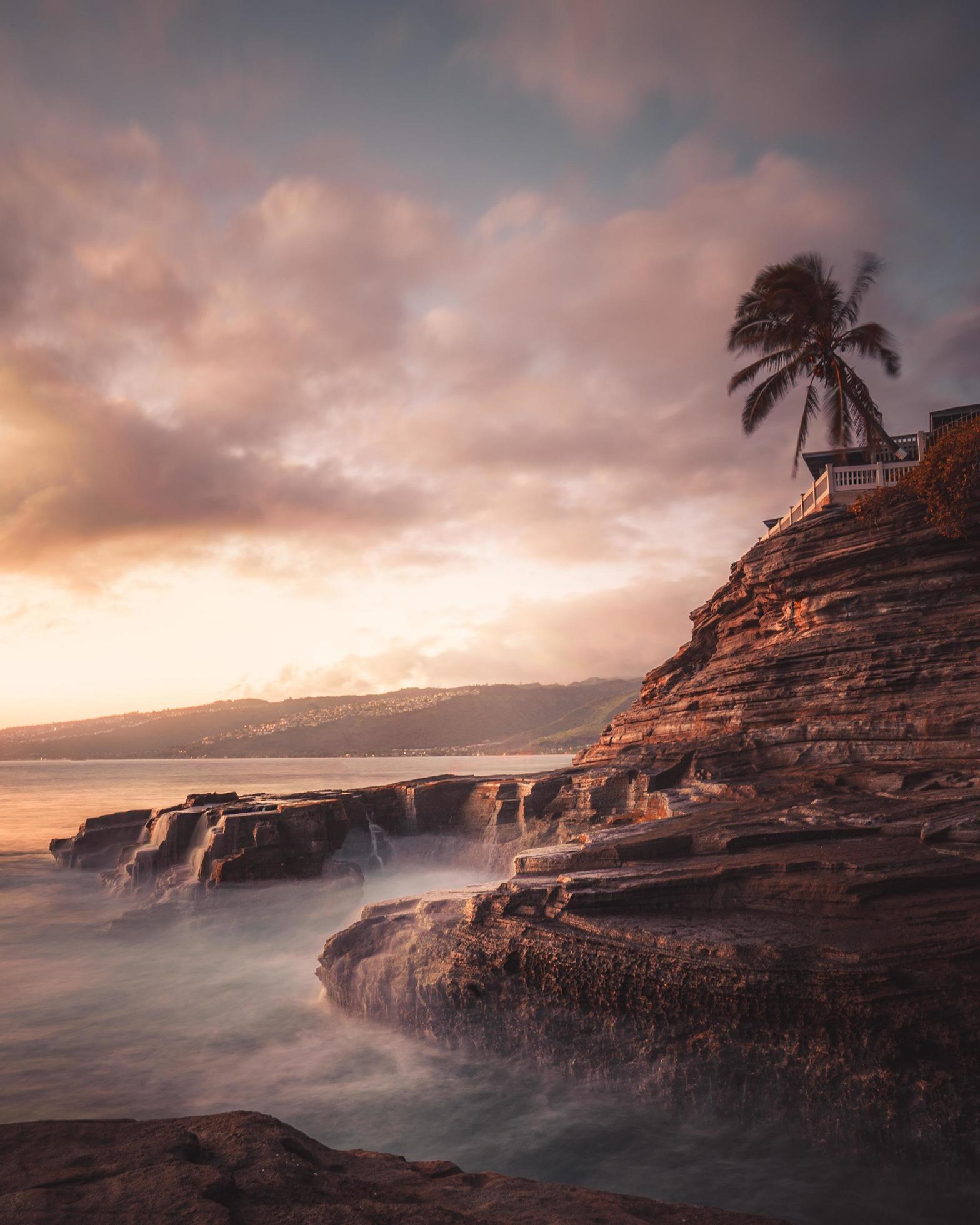 Cliff and ocean at sunset Stock Free