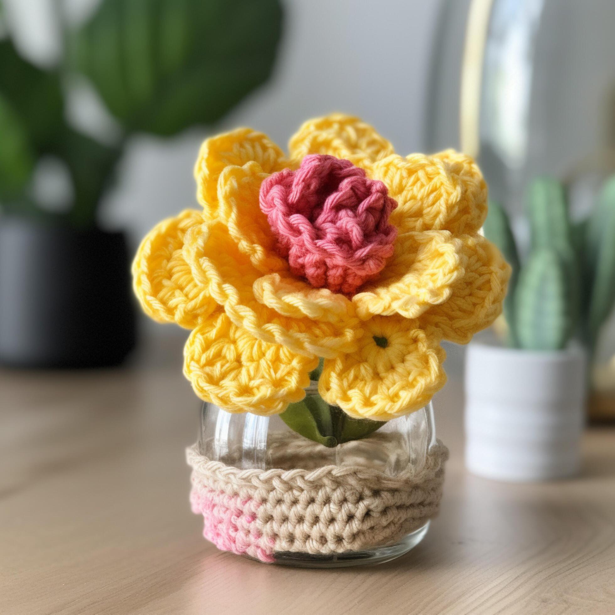 A yellow and pink flower in a vase Stock Free