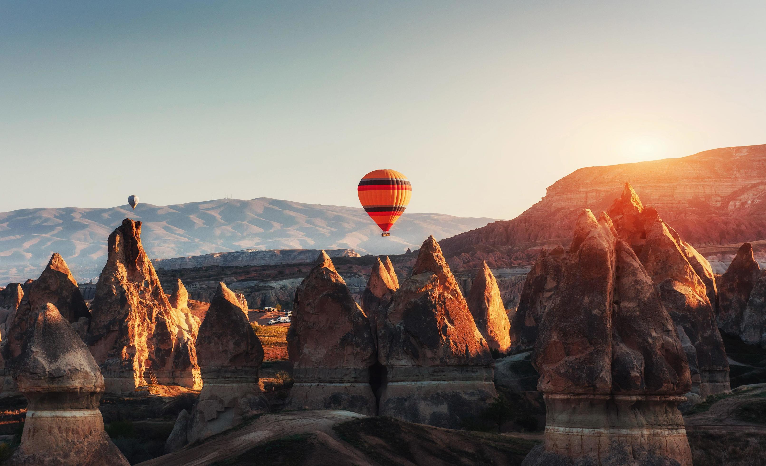 Amazing sunset over Cappadocia. Beautiful color balloons. Turkey Stock Free