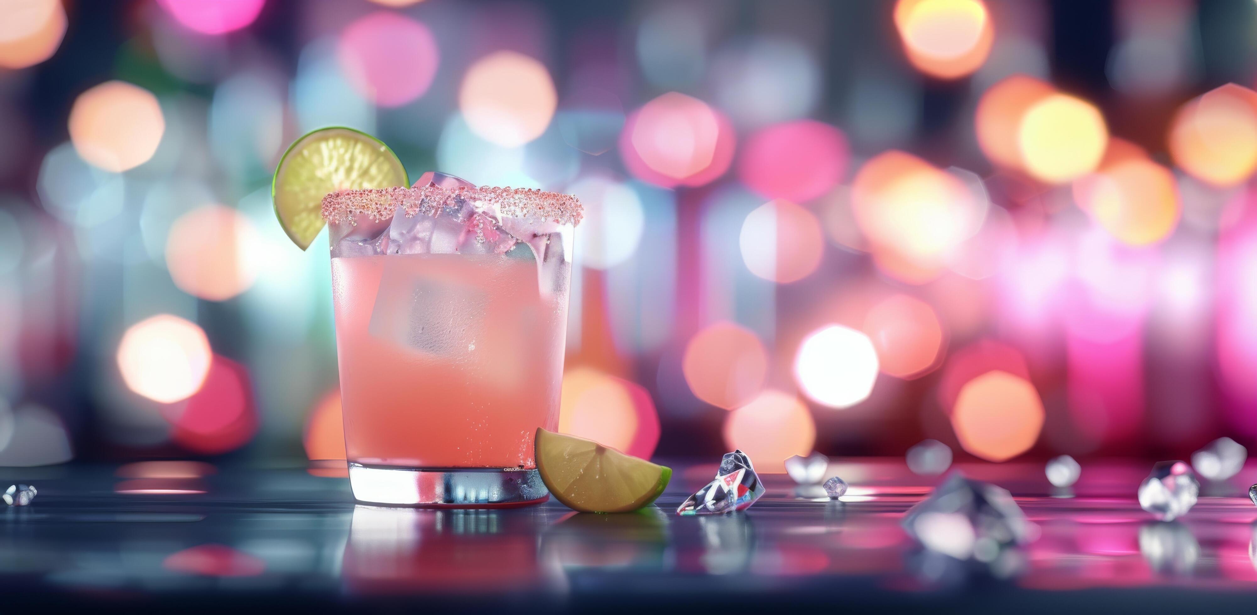 Refreshing Cocktail With Lemon Garnish Against Colorful Bokeh Background Stock Free