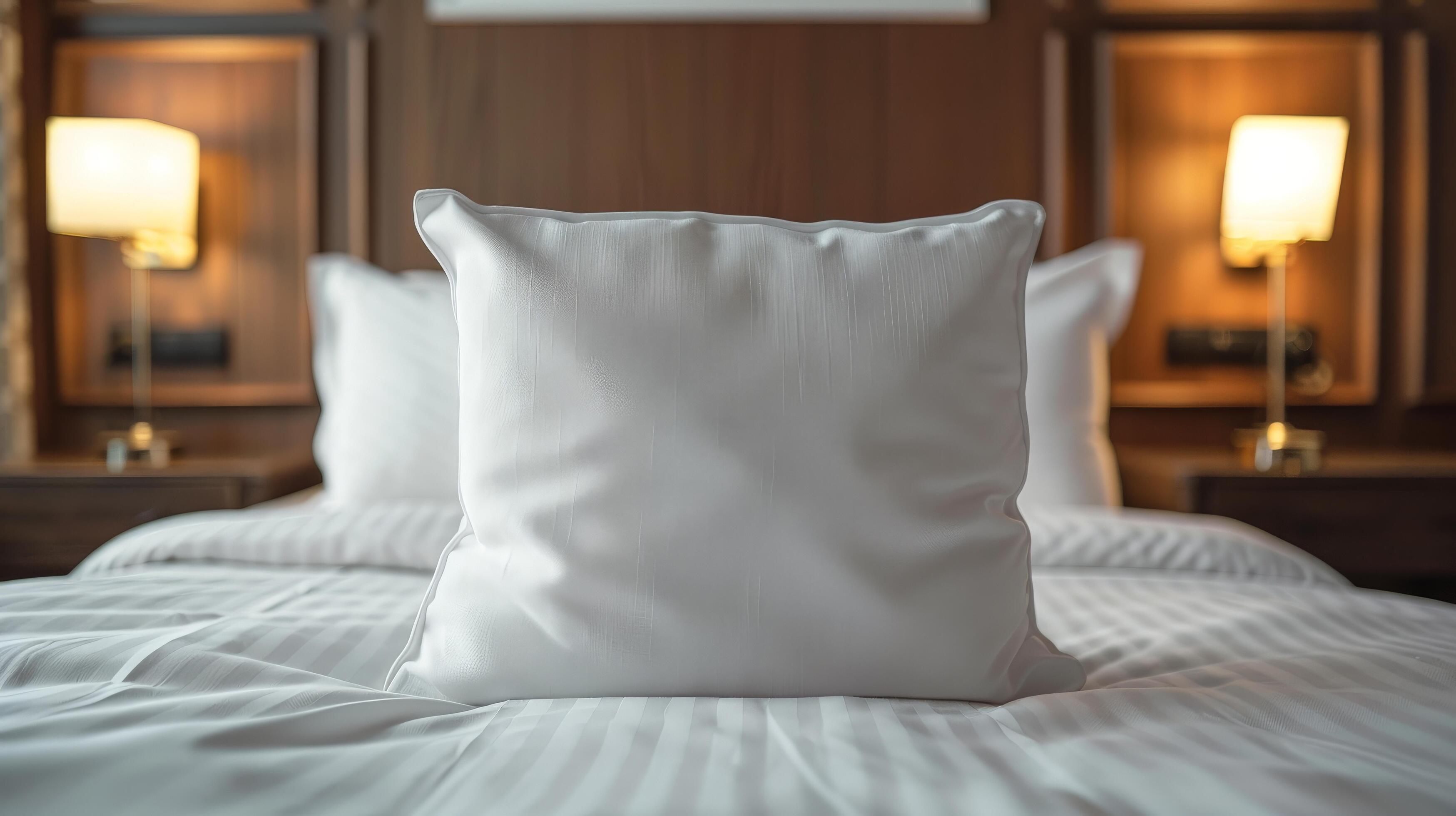 White Pillow on a Made Bed in a Hotel Room Stock Free