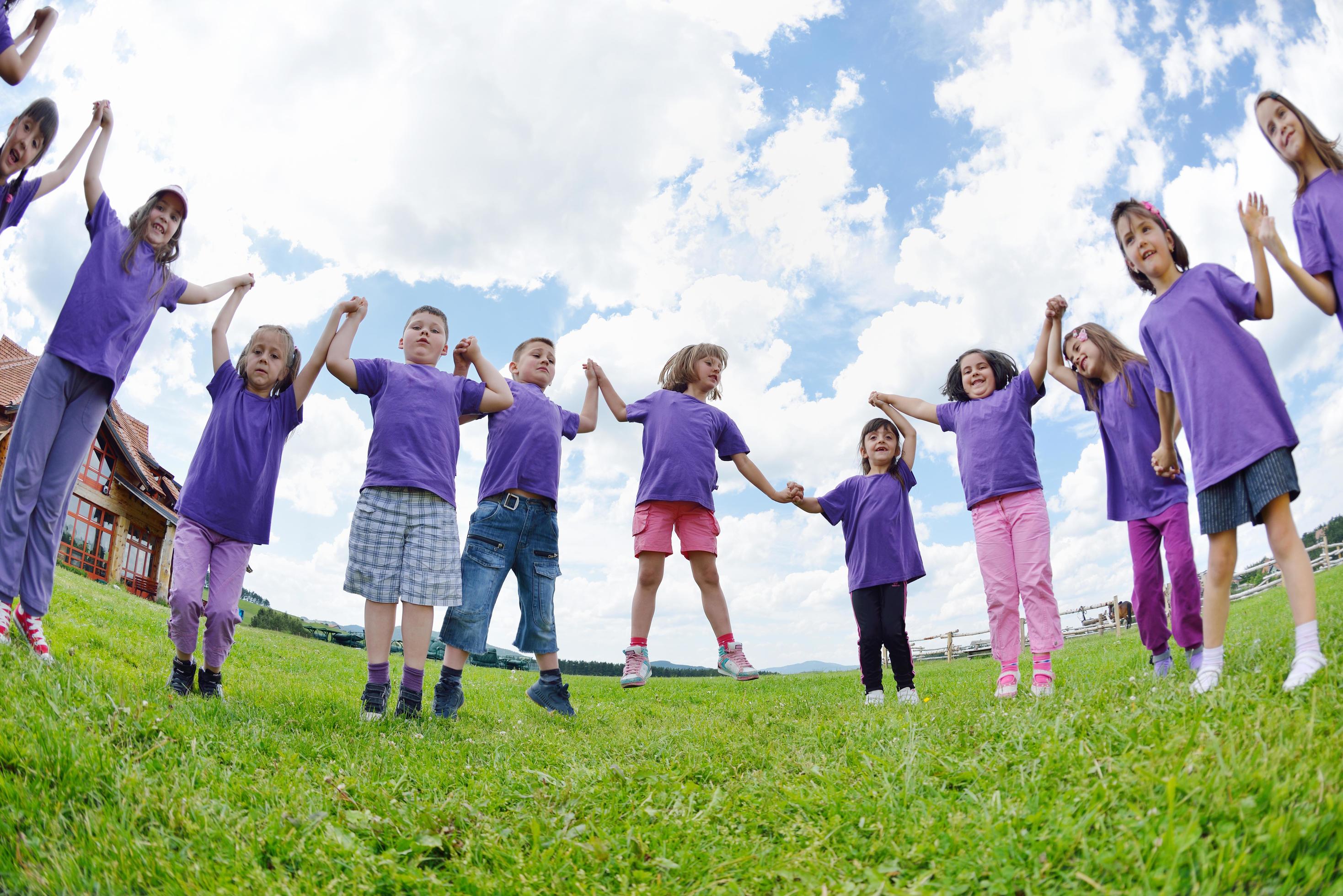 happy kids group have fun in nature Stock Free