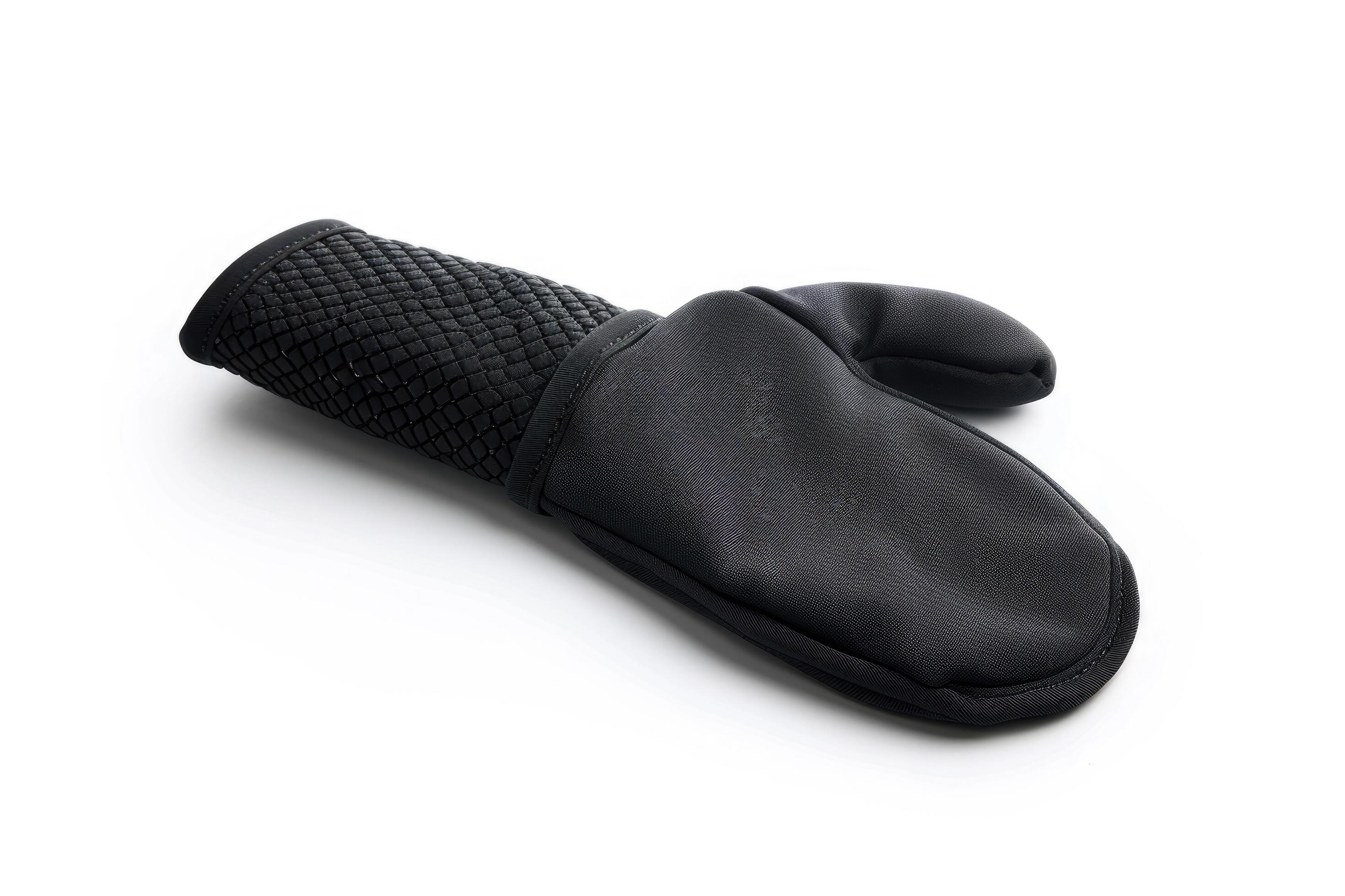 
									Black silicone oven mitt on a white background. Stock Free