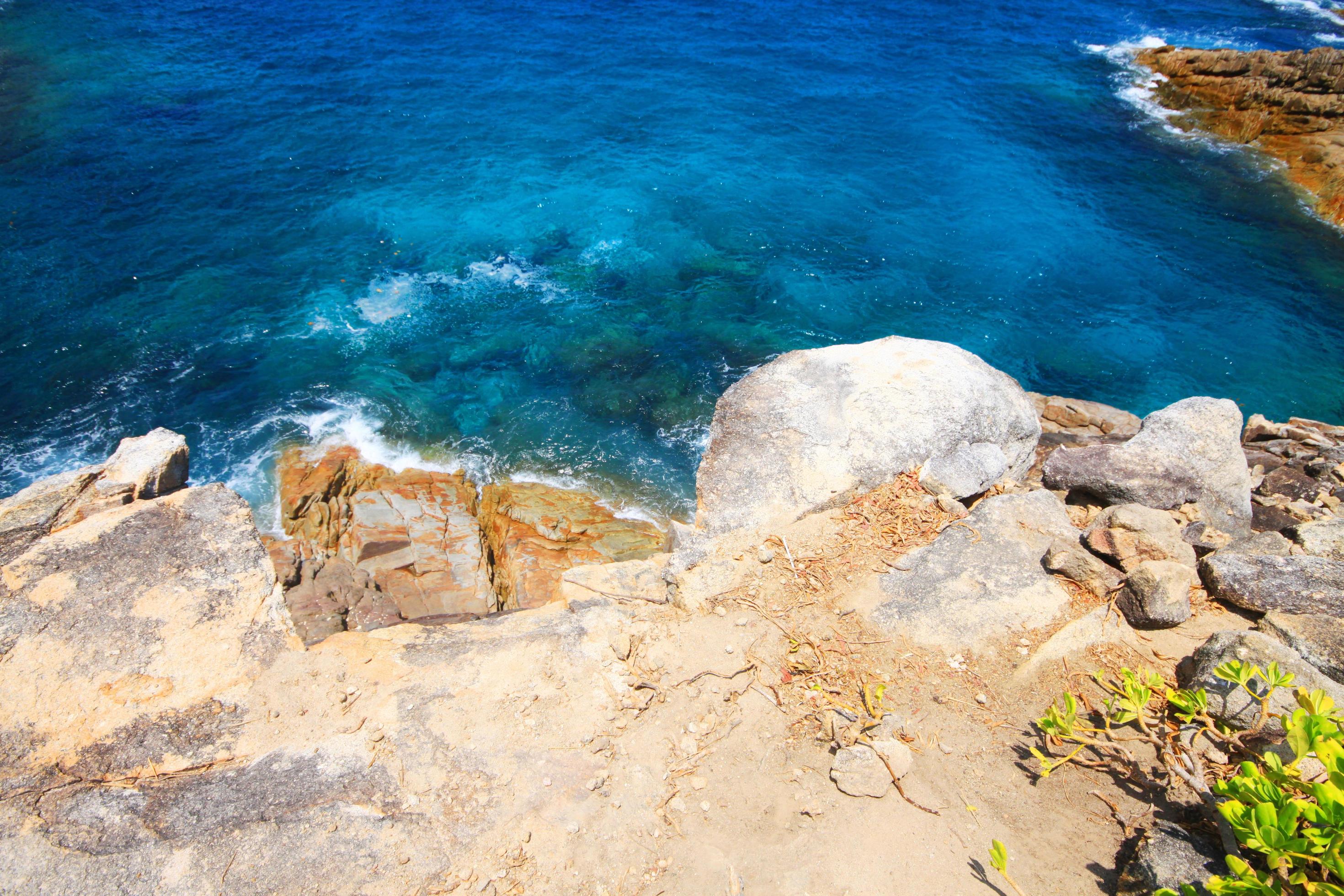 Beautiful Paradise summer and seascape with sunset of sea horizon and Calm ocean near rock Cape Stock Free