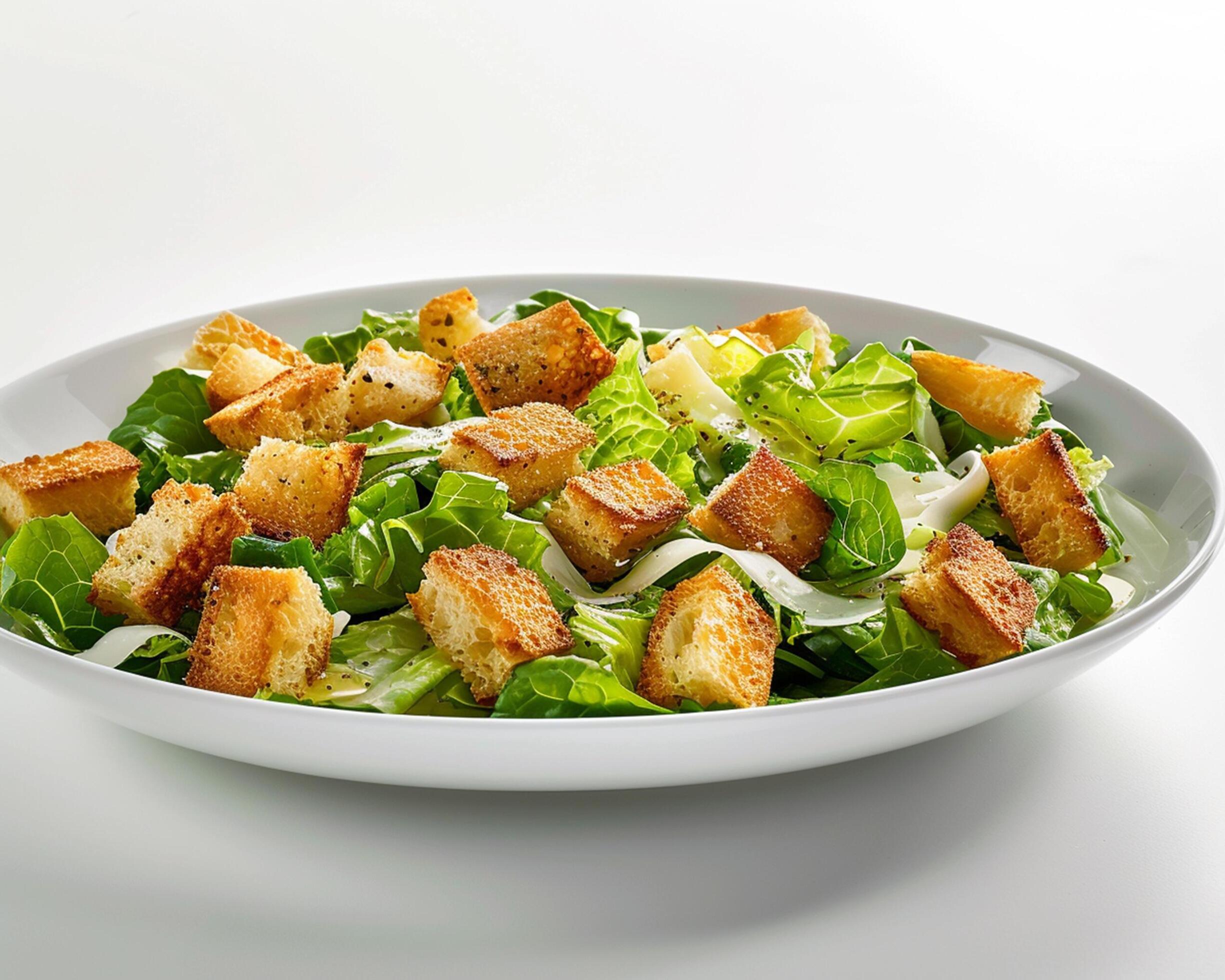 a salad with croutons and lettuce Stock Free