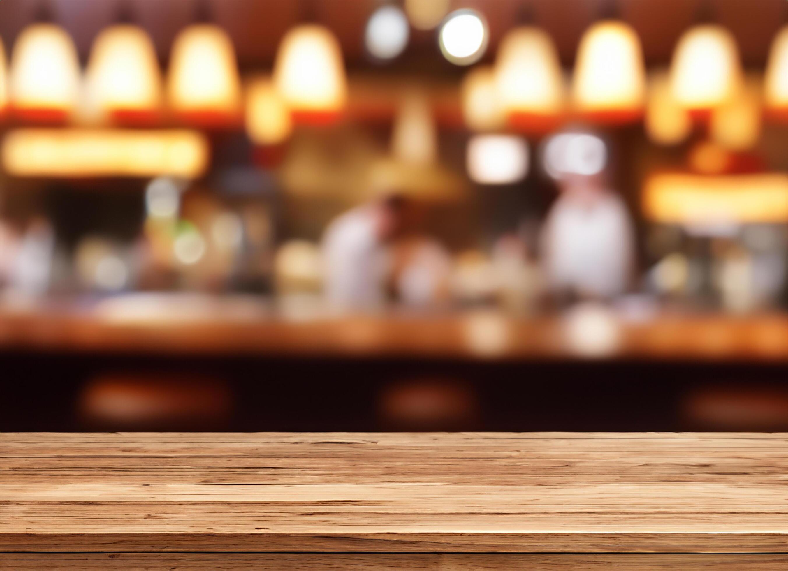 Wood table with restaurant background Stock Free