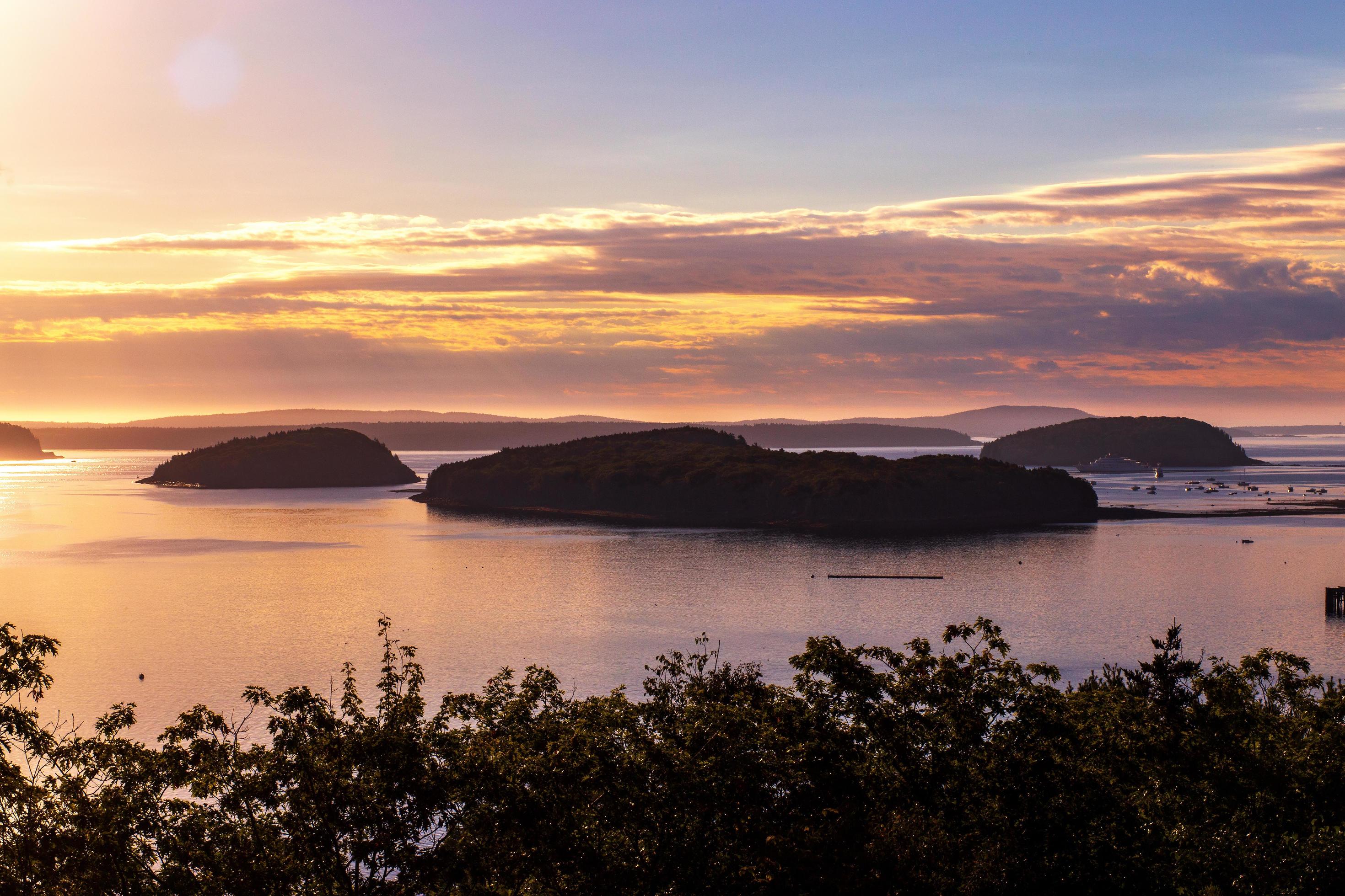 View of the islands in the harbor at the sunrise time Stock Free