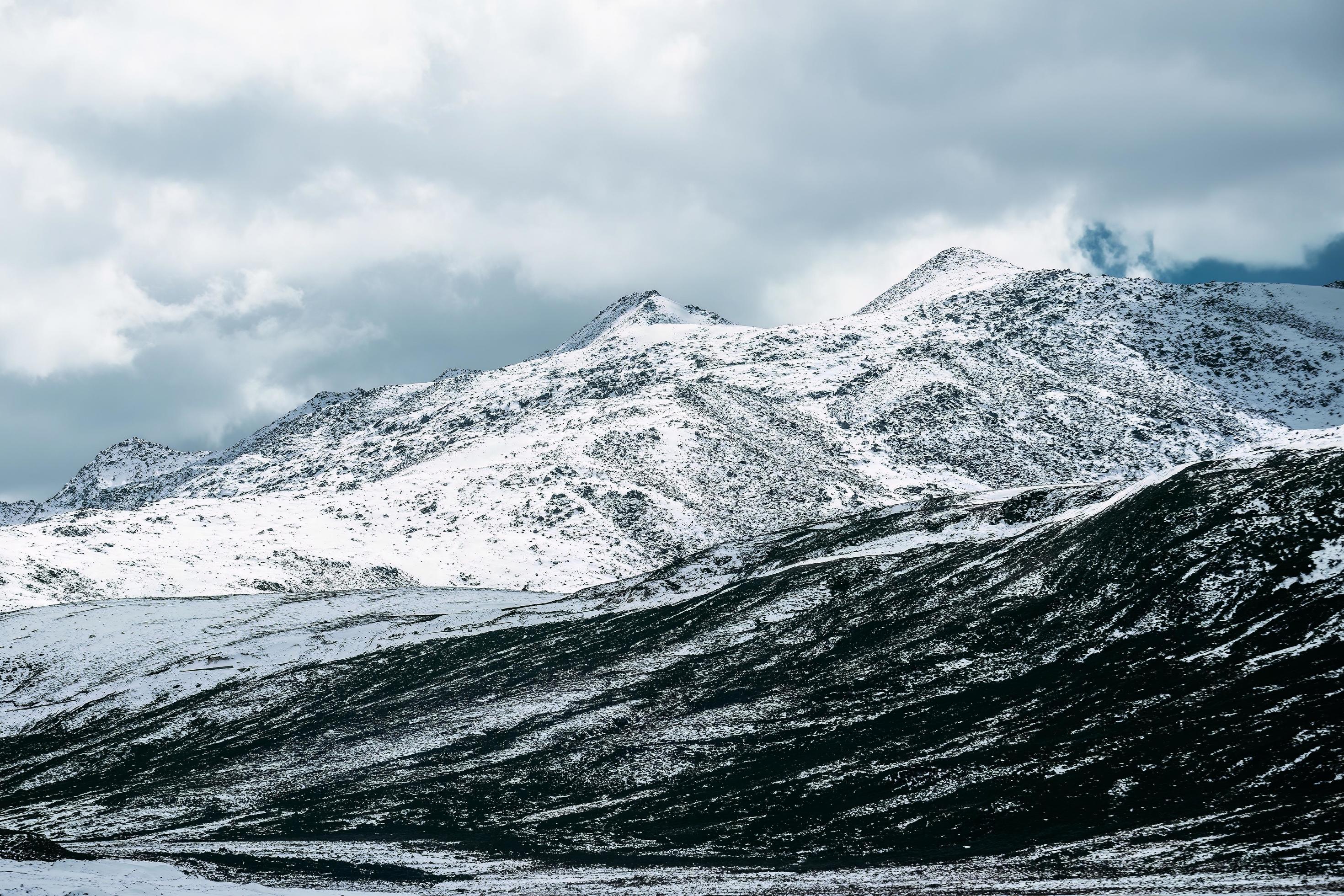 Spectacular scenery in the high mountains of western Sichuan, China, with different seasons Stock Free