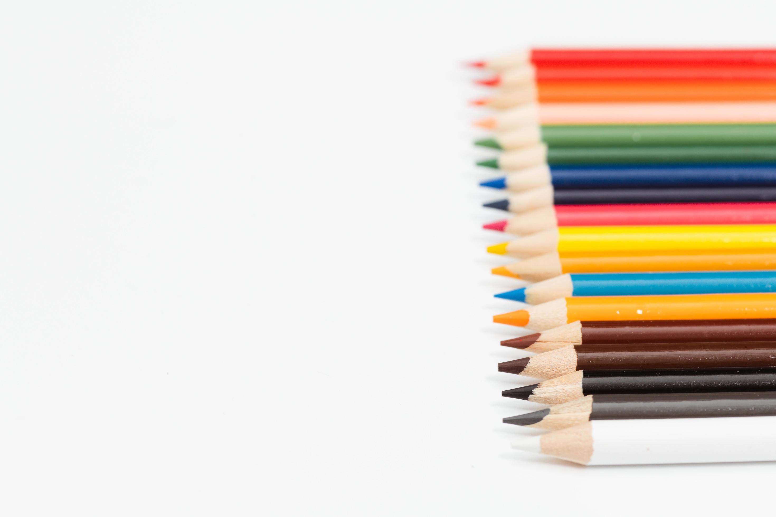 
									Multi color pencils. the concept of a multinational family and equality in the world. Stock Free