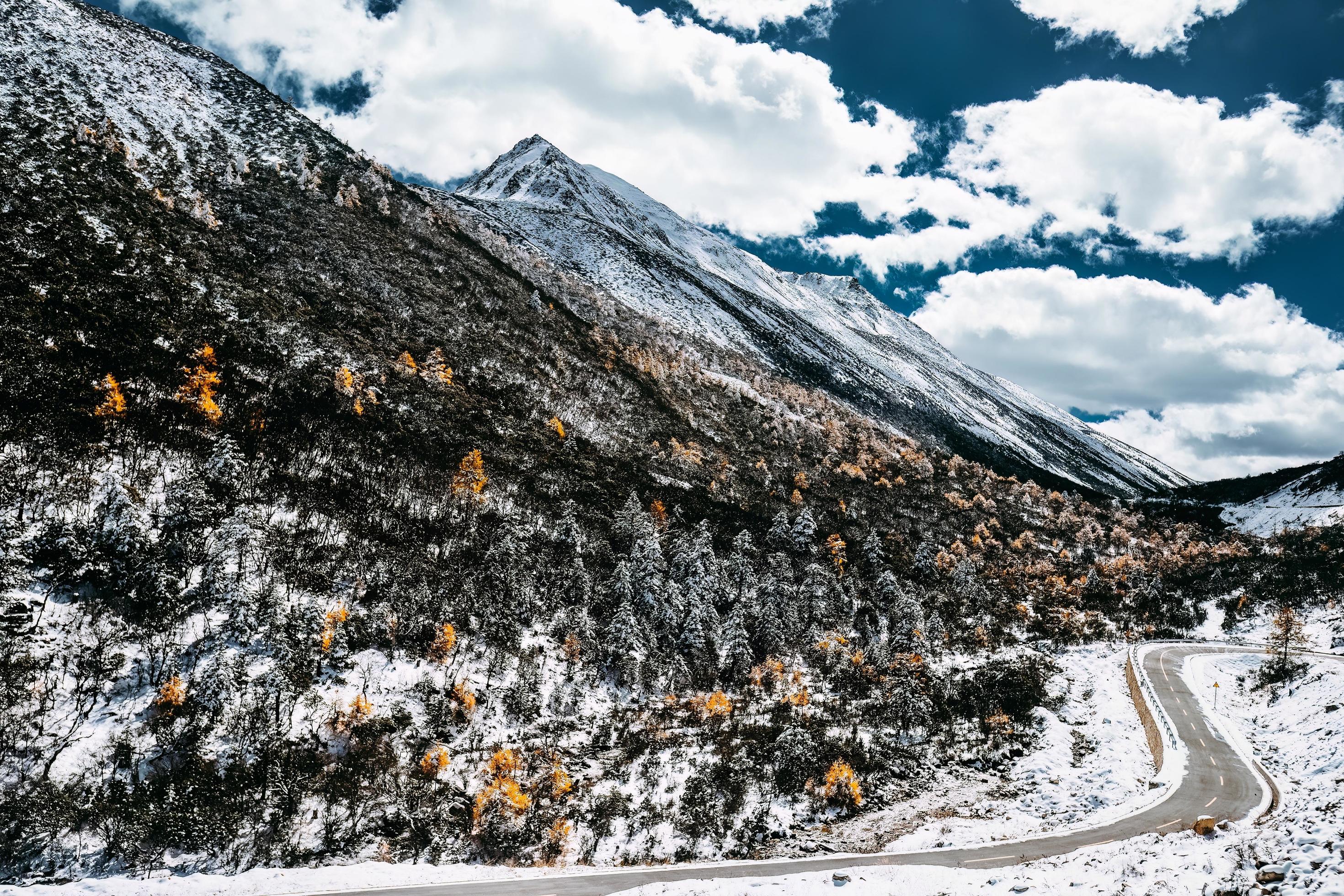 Spectacular scenery in the high mountains of western Sichuan, China, with different seasons Stock Free