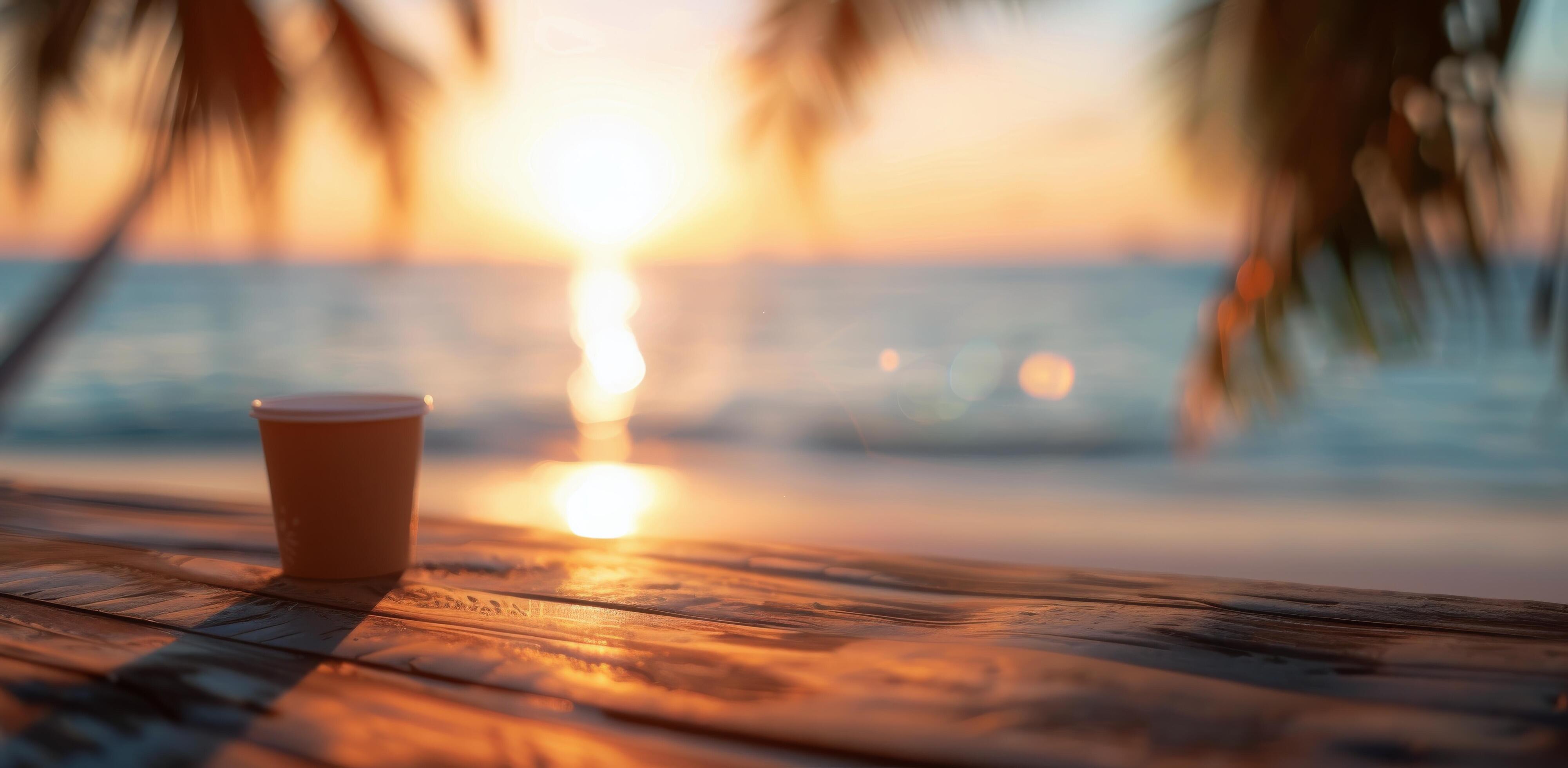 Refreshing Drink at Sunset on the Beach With Palm Trees in the Background Stock Free