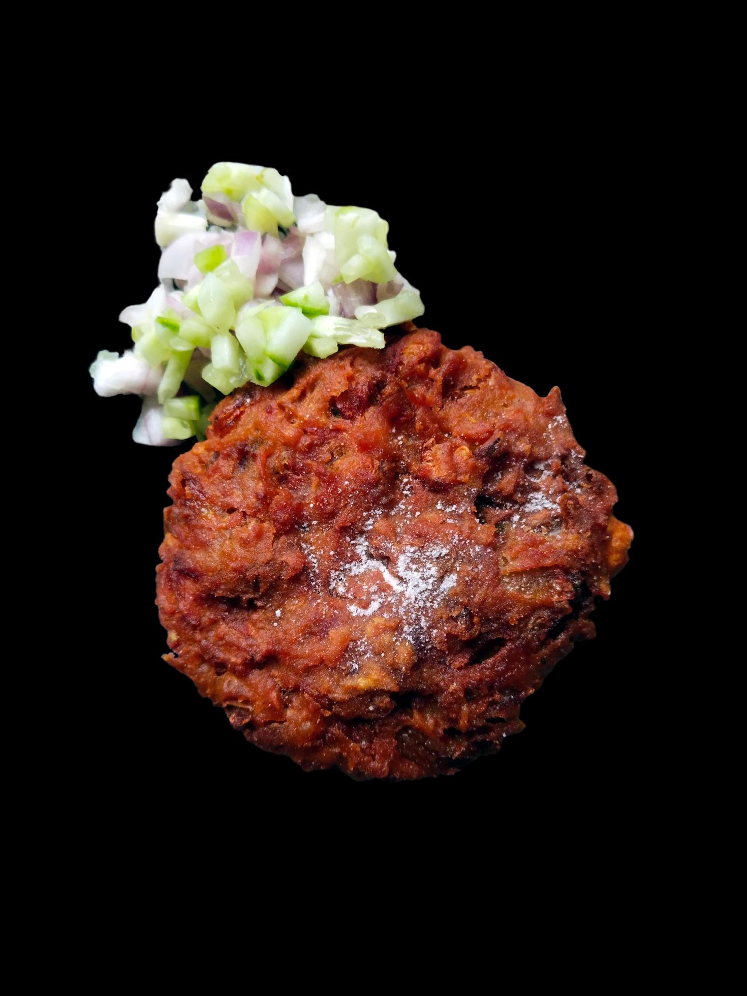 Beef Shami Kabab, Mutton Shami Kabab Close-up With Onion and Cucumber Indian Street Food in Black Background. Stock Free