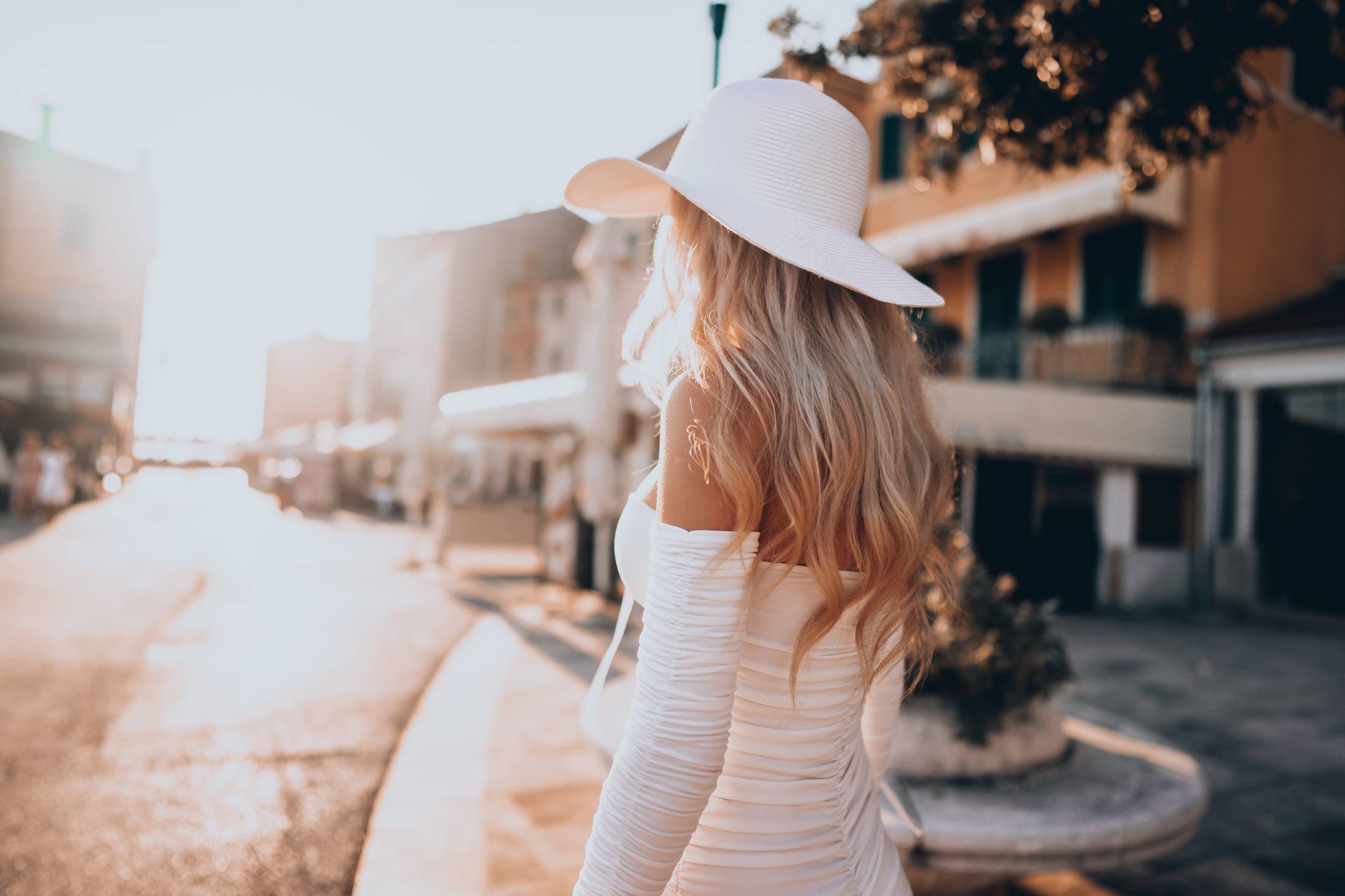 Woman in Summer Dress Enjoying Old Croatian Towns Free Photo