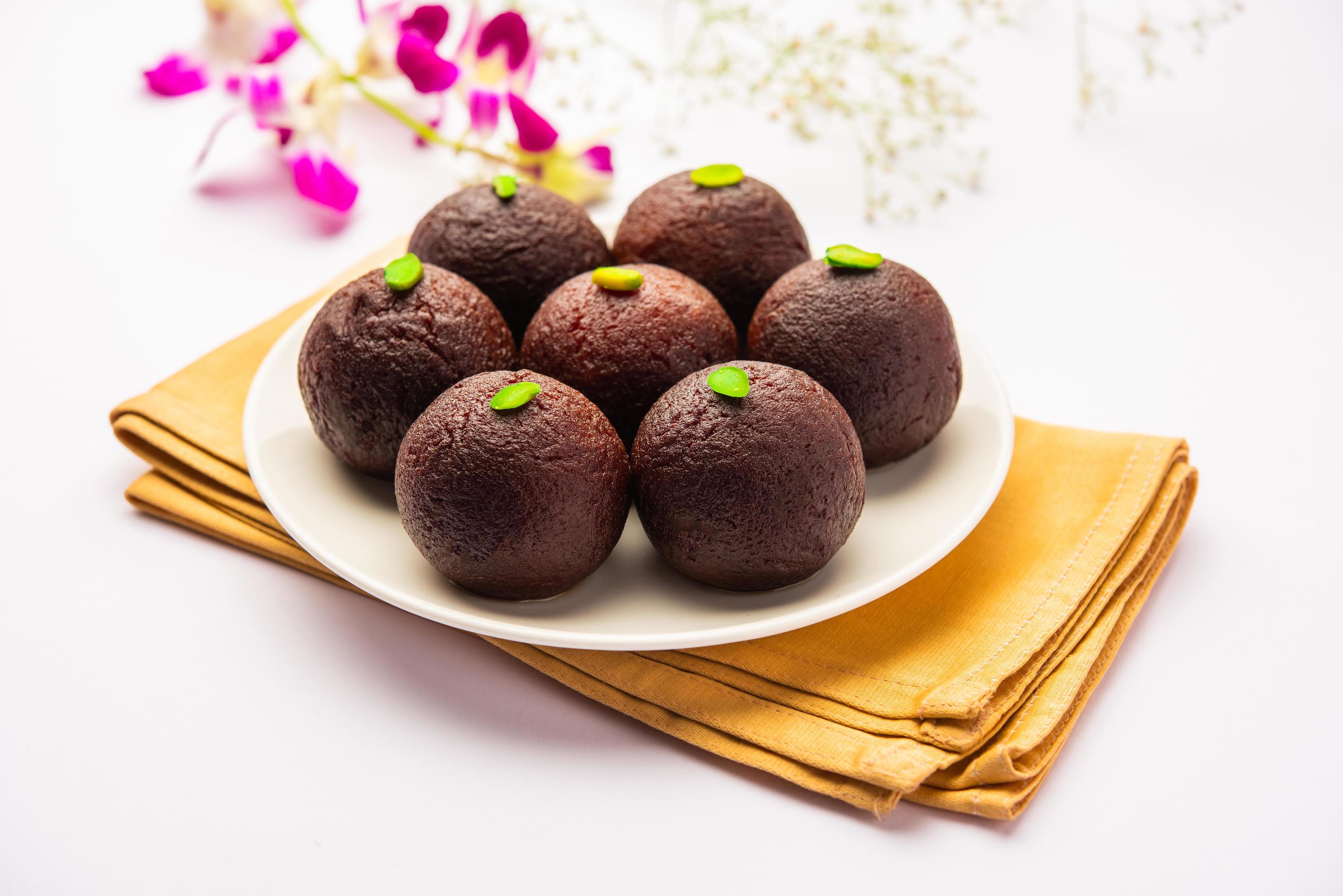 Indian Sweet Food Sweet Black Gulab Jamun Also Known as Kala Jamun, Black Jamun or Dry Kala Jam Stock Free