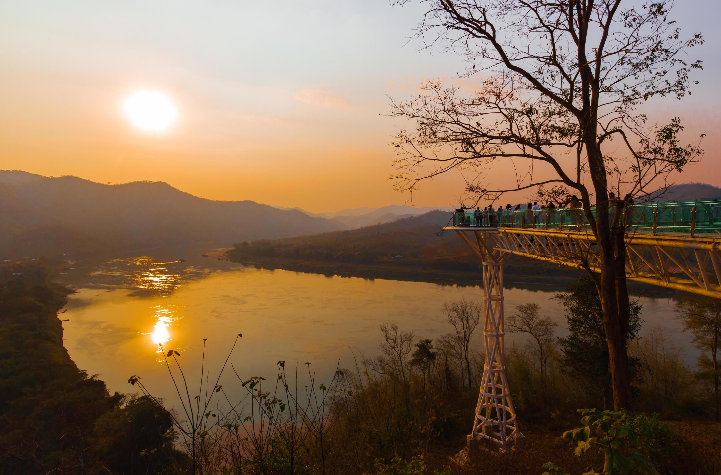 The scenery of the evening sunset along the Mekong River at the Skywalk in Chiang Khan Province. Stock Free