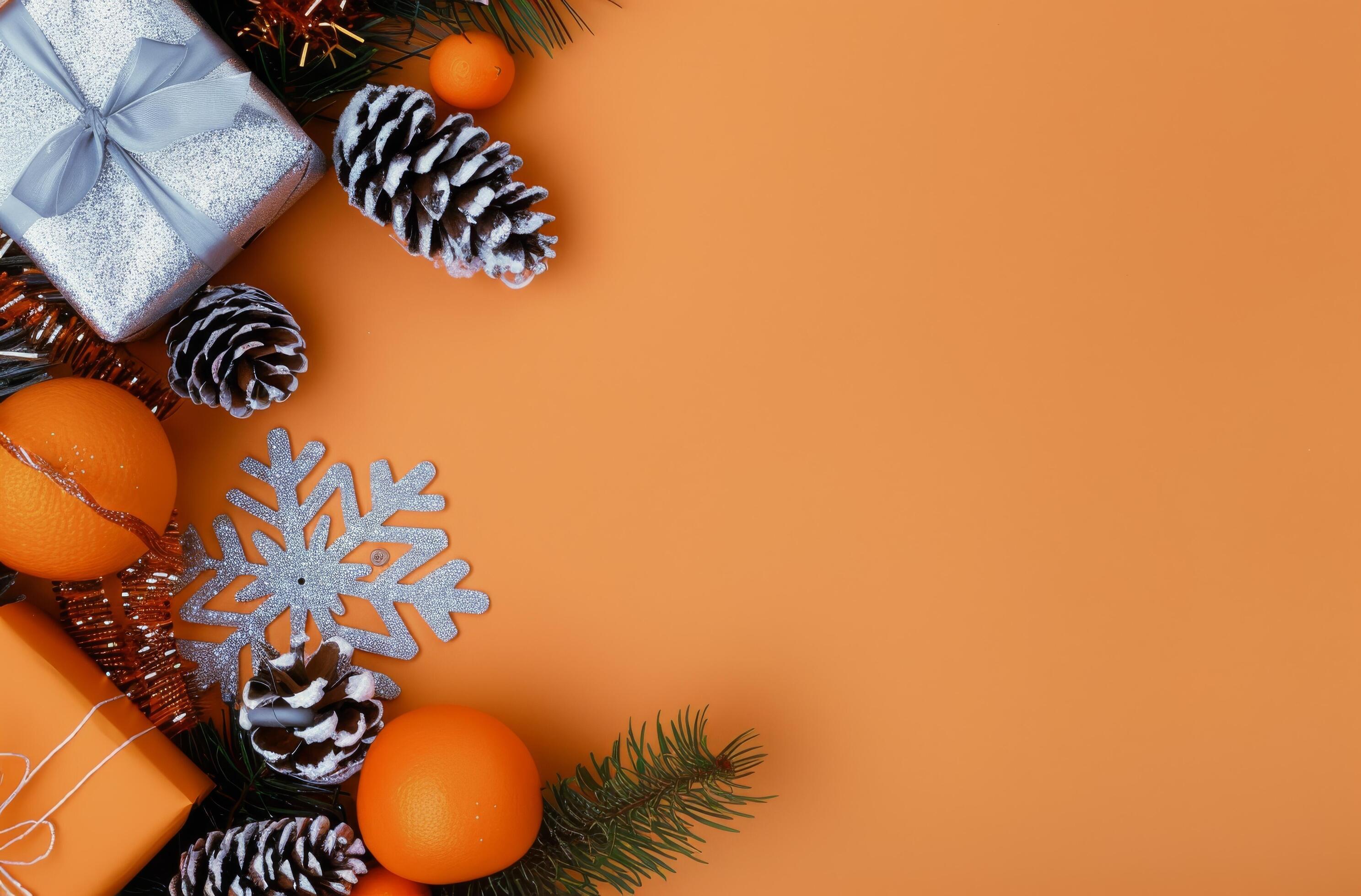 Festive Holiday Decorations With Oranges, Pinecones, and a Gift on Orange Background Stock Free