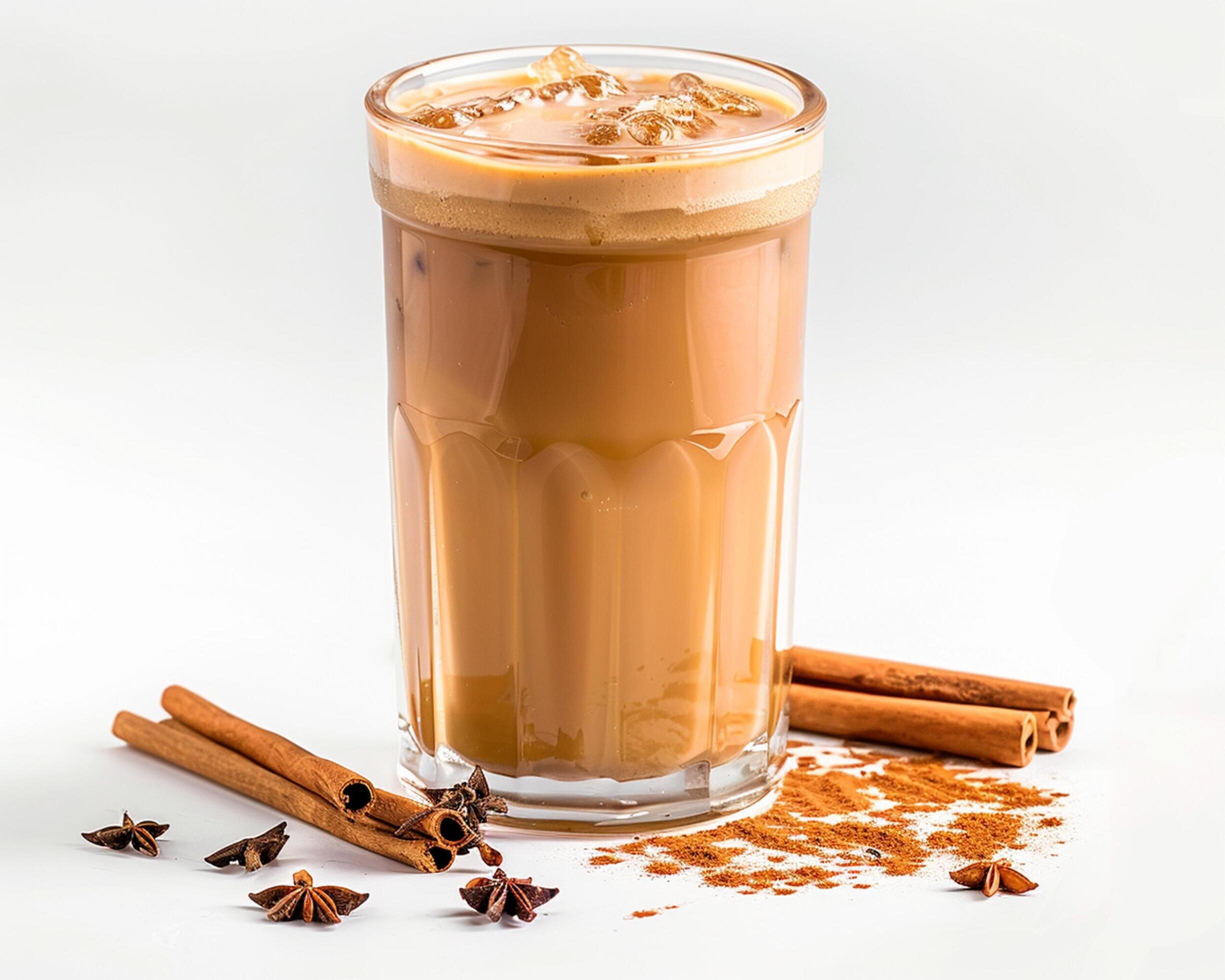 a glass of coffee with cinnamon and anise Stock Free