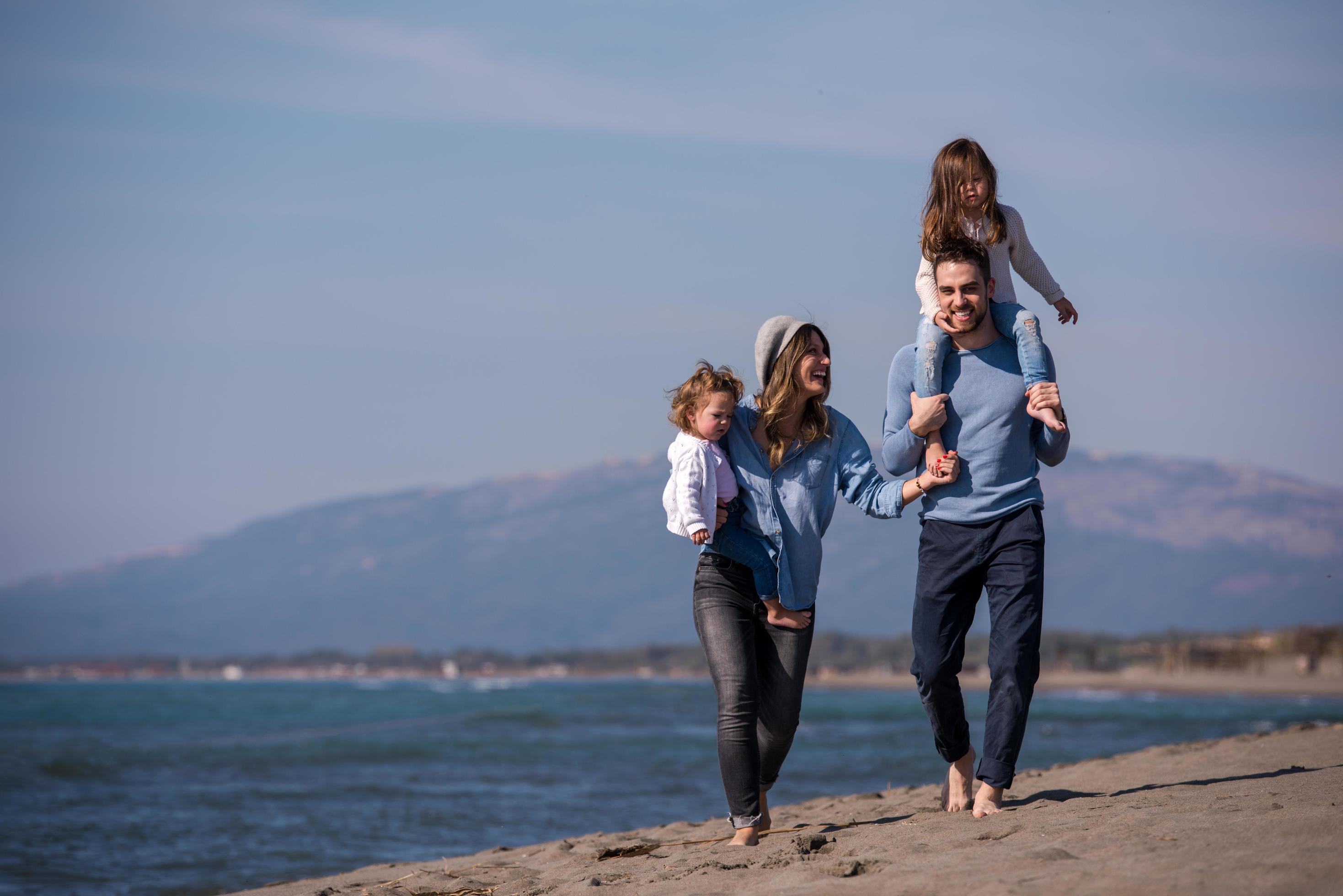 Young family enjoying vecation during autumn Stock Free