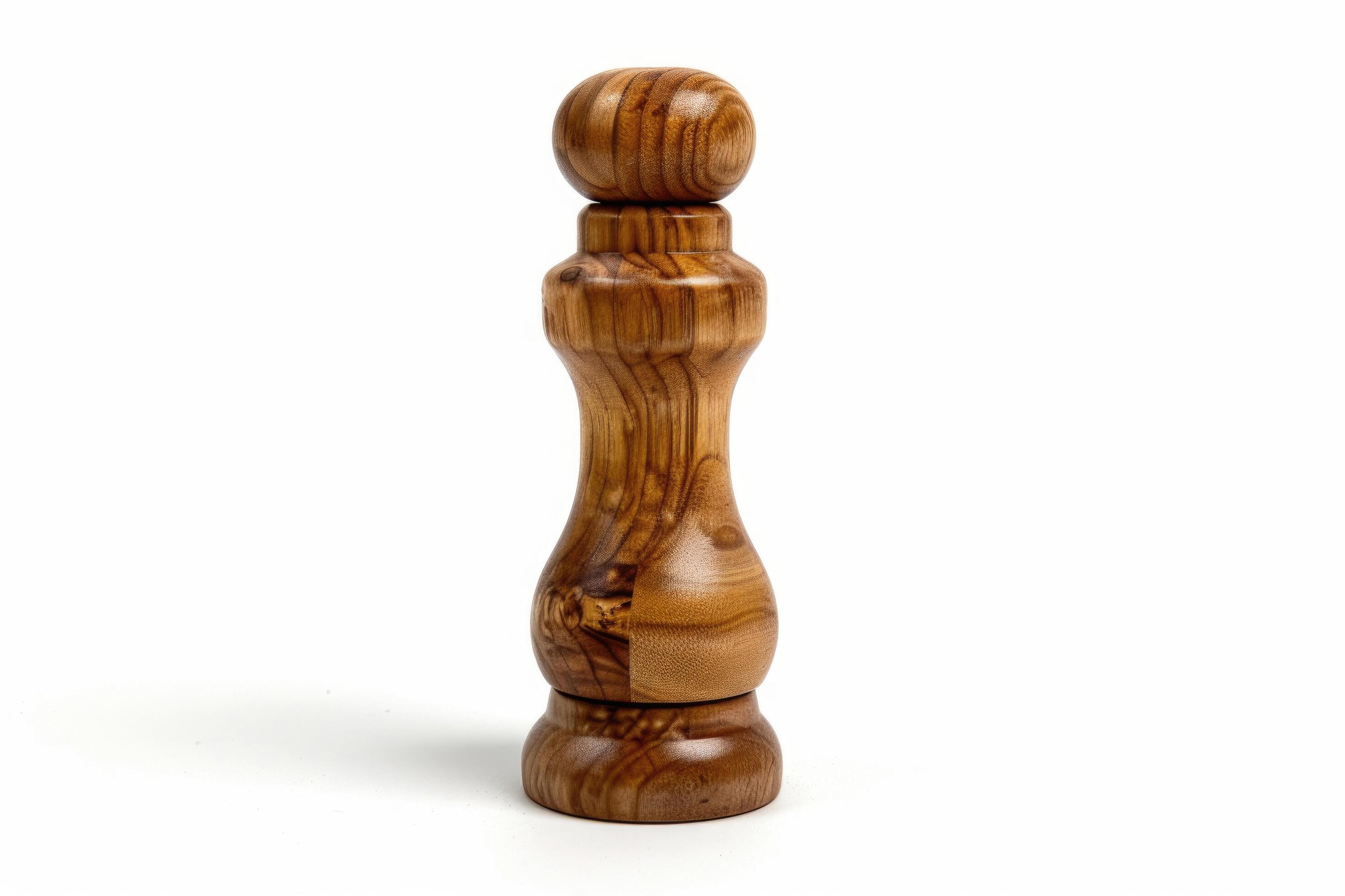 Wooden pepper mill on a white background. Stock Free